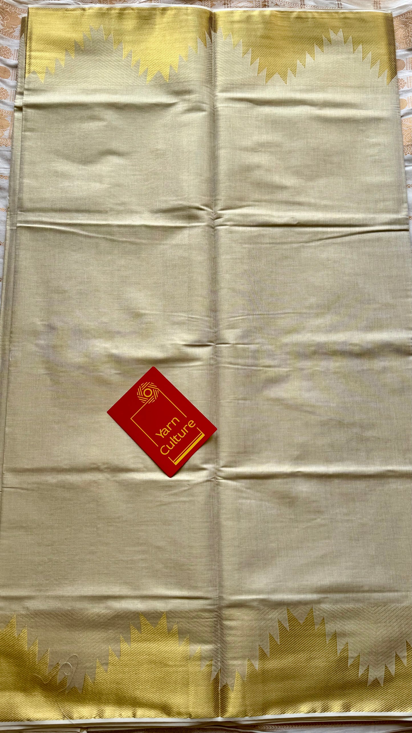 Ivory and gold soft tissue cotton saree, temple motif border - YCIEON81
