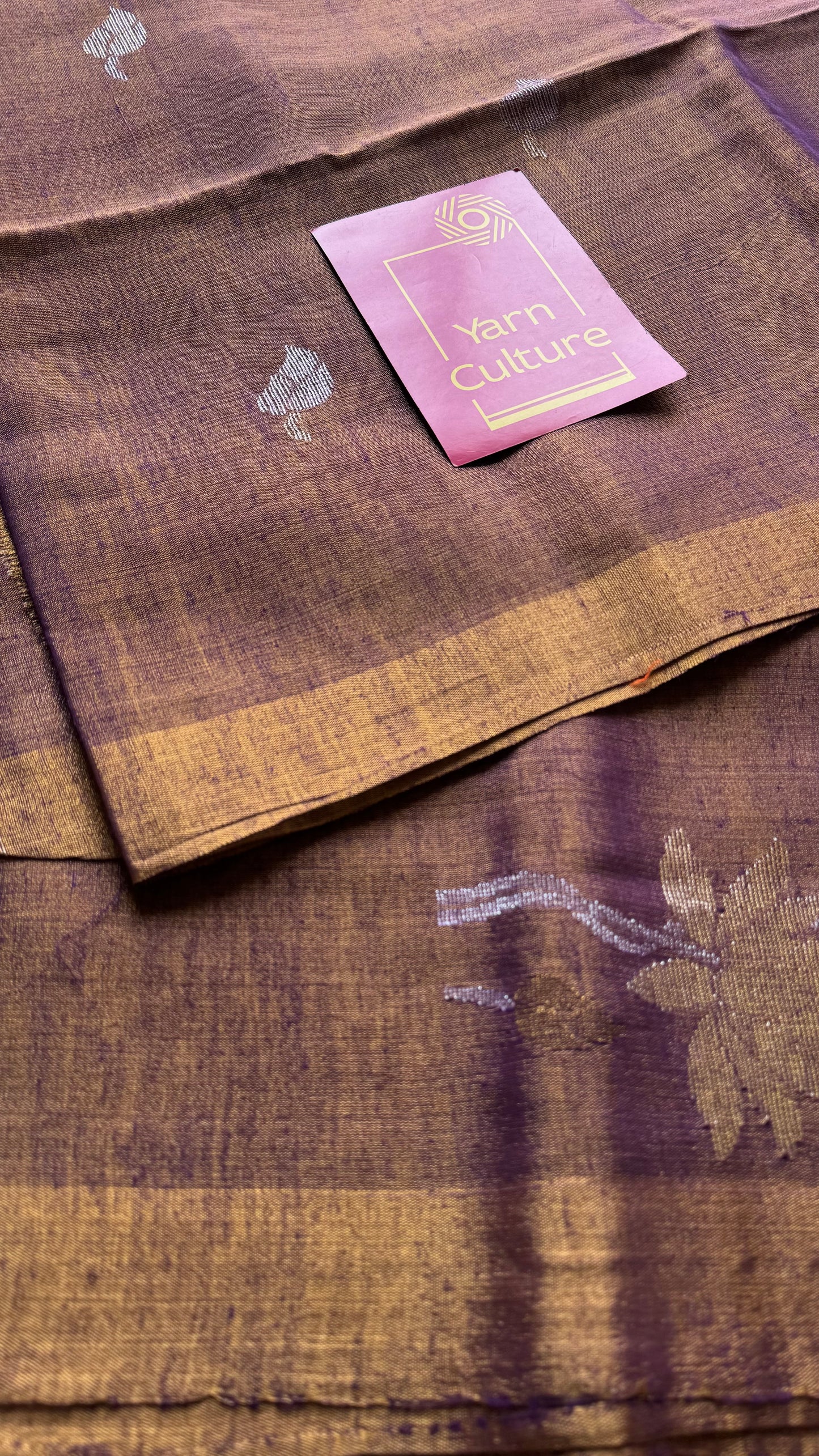 Handwoven purple gold dual tone tissue linen saree with lotus motifs - YCBCLTFE401