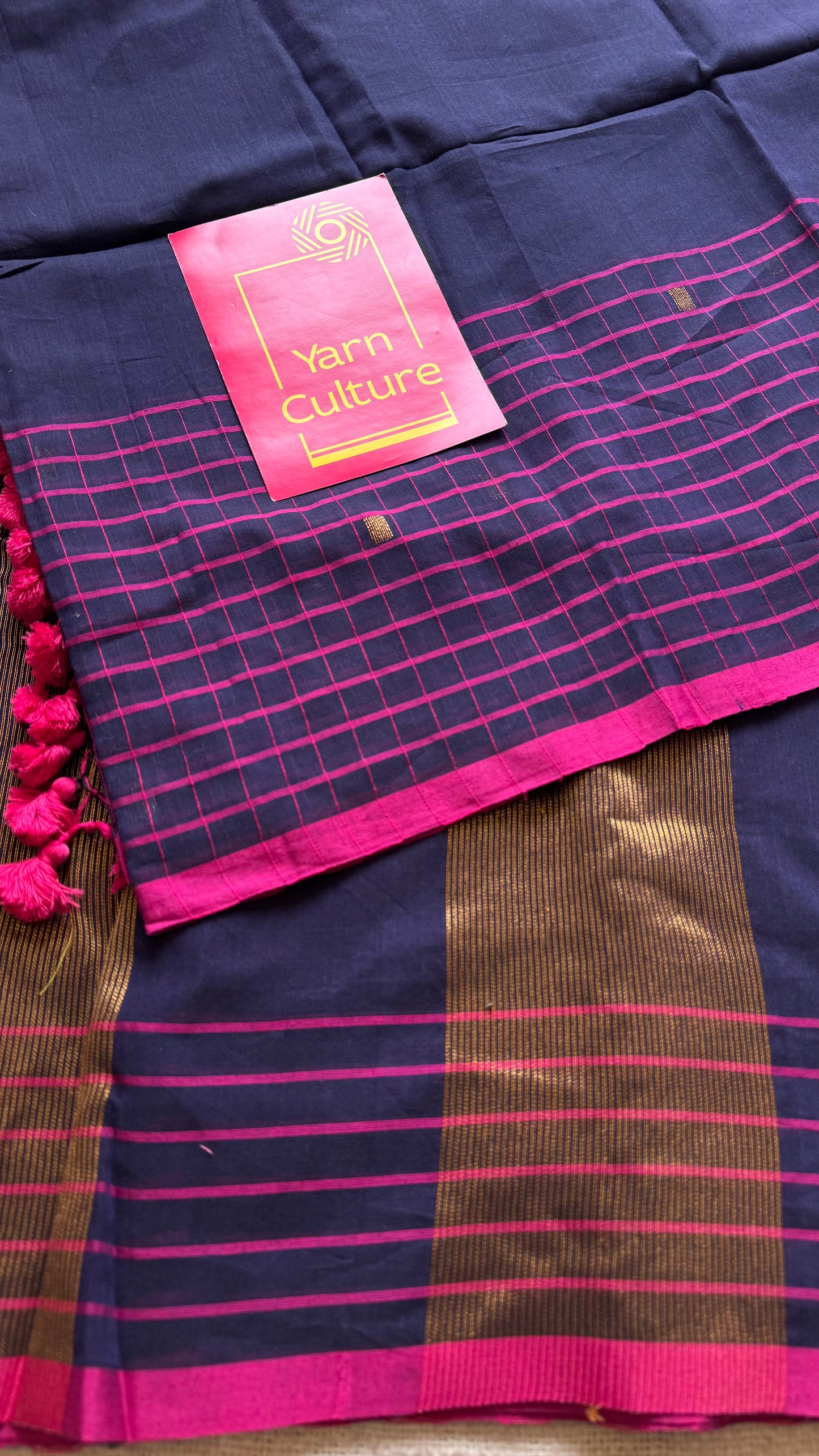 Navy handloom mul saree with hot pink checkered borders and antique gold buttas - YCBCMCFE386