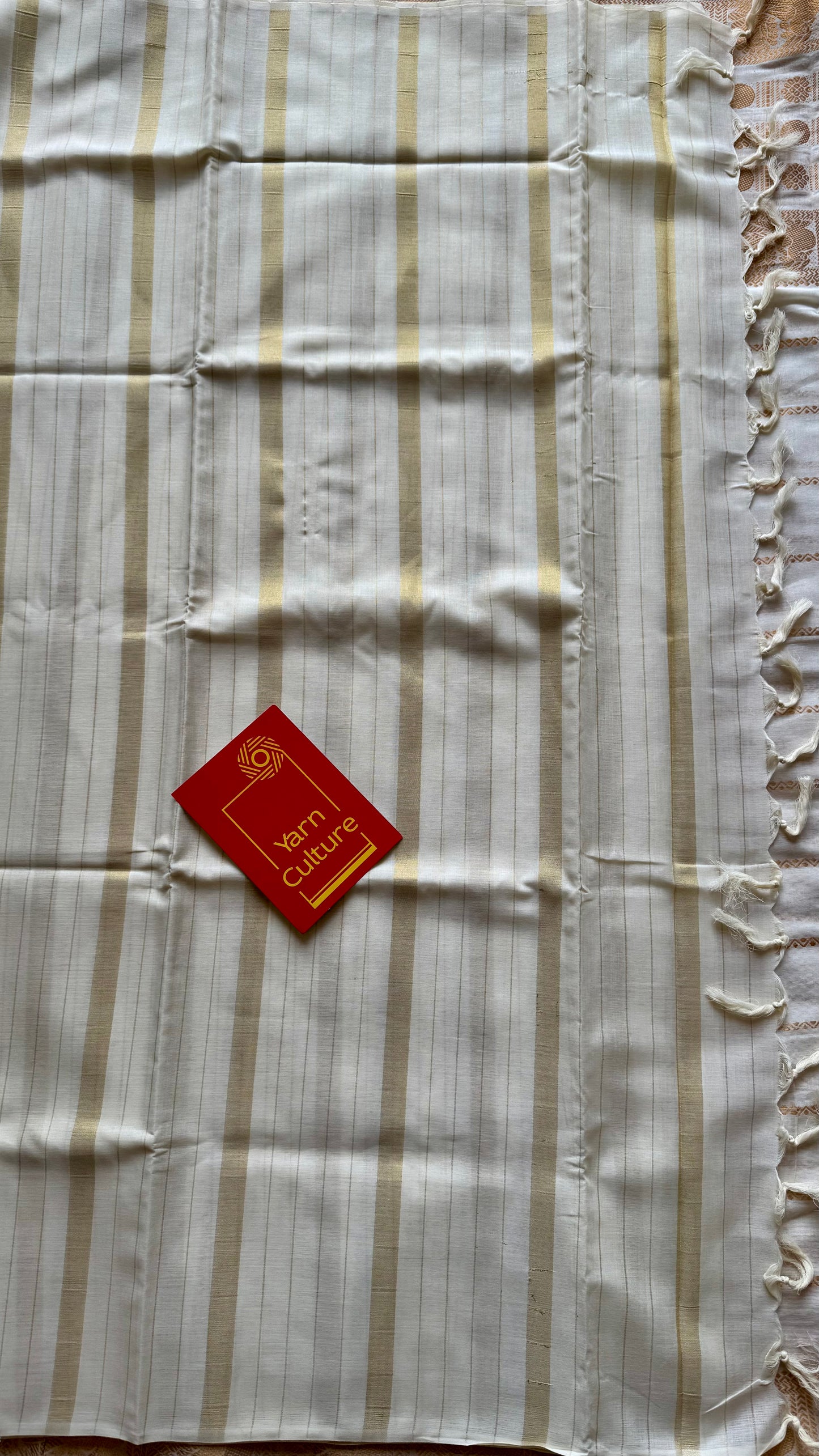 Ivory and gold kerala saree with gold stripes - YCIEON44