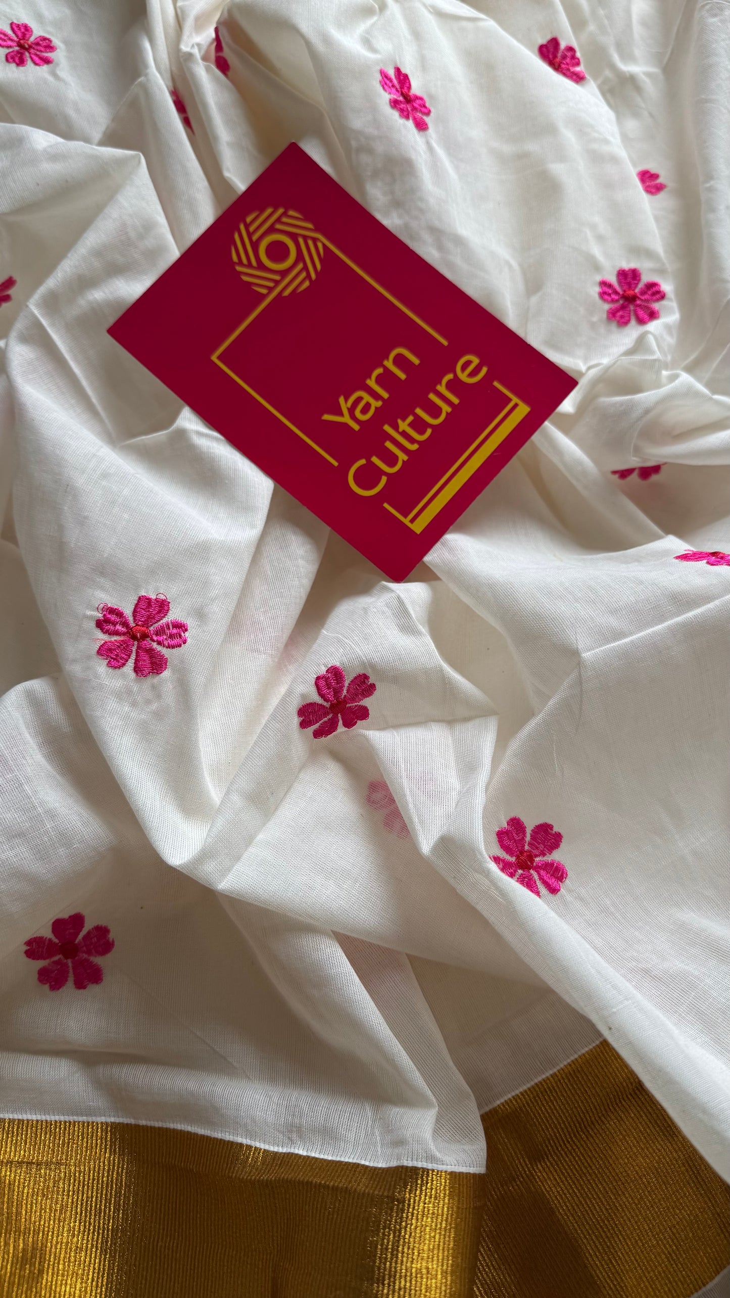 Ivory and antique gold soft cotton kasavu saree, pink parijat floral embroidery - YCIEON155