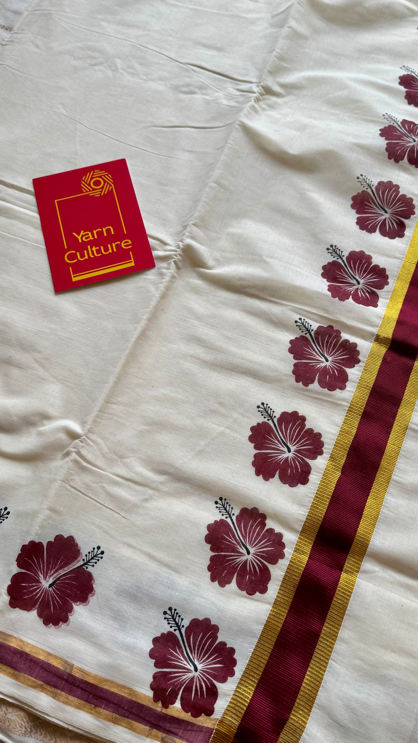 Ivory and gold soft cotton saree, maroon hibiscus (chembarathi) flowers - YCIEON62