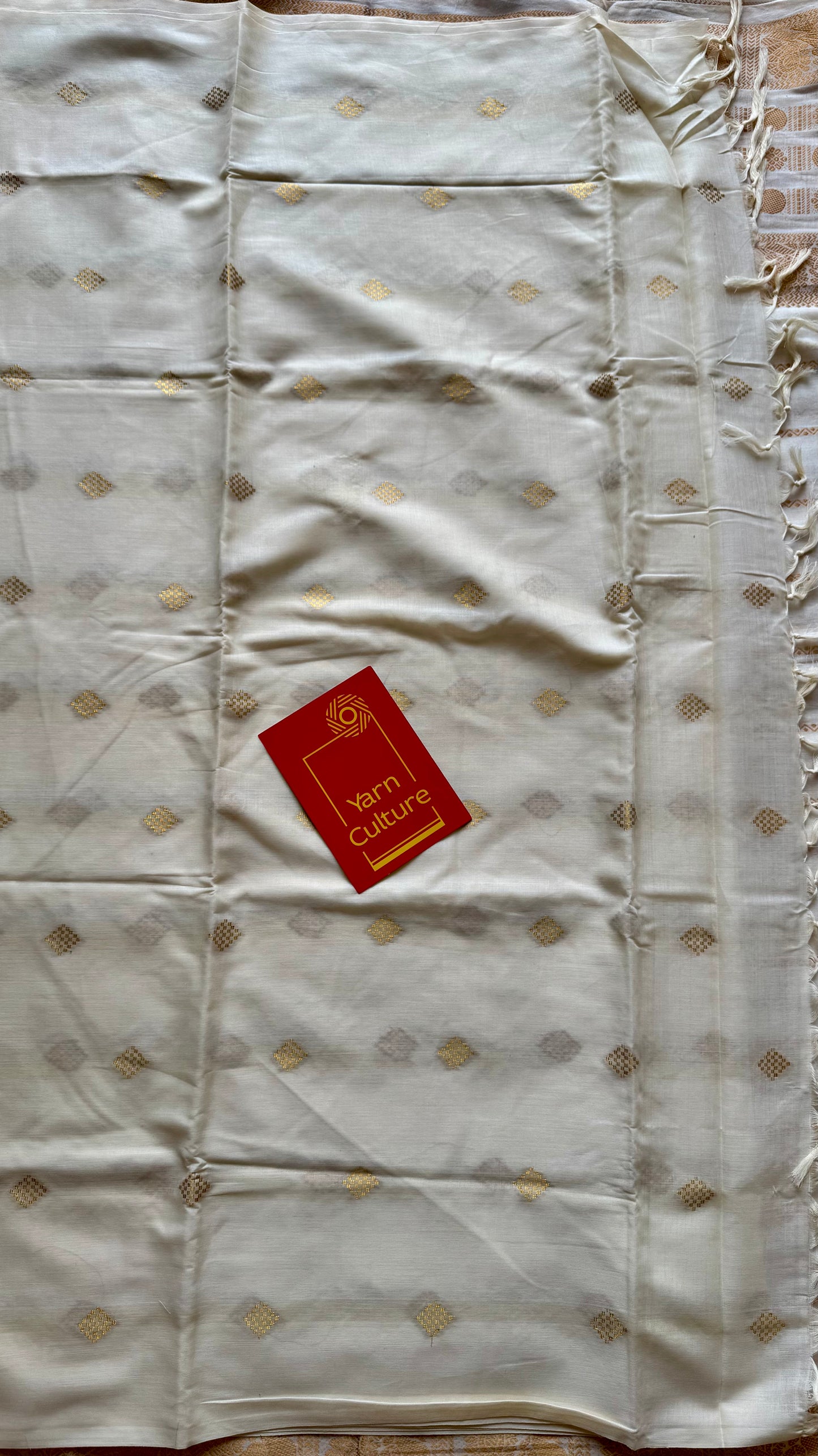 Ivory and gold kerala saree with woven buttas - YCIEON42