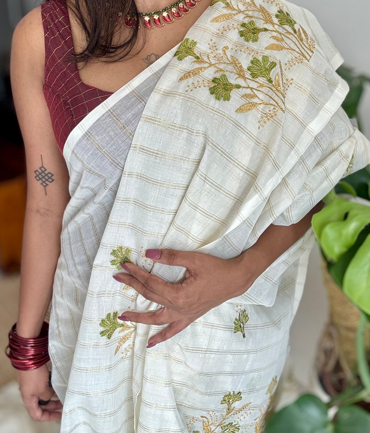 Ivory and gold soft cotton saree, light green floral embroidery  - YCIEON49
