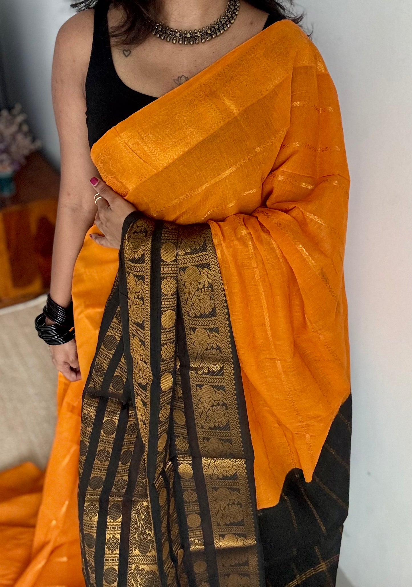 Turmeric yellow (towards orange) with black, peacock rudraksham motif, single side broad zari - madurai kattuchayam dyed - YCCOTNAURS16