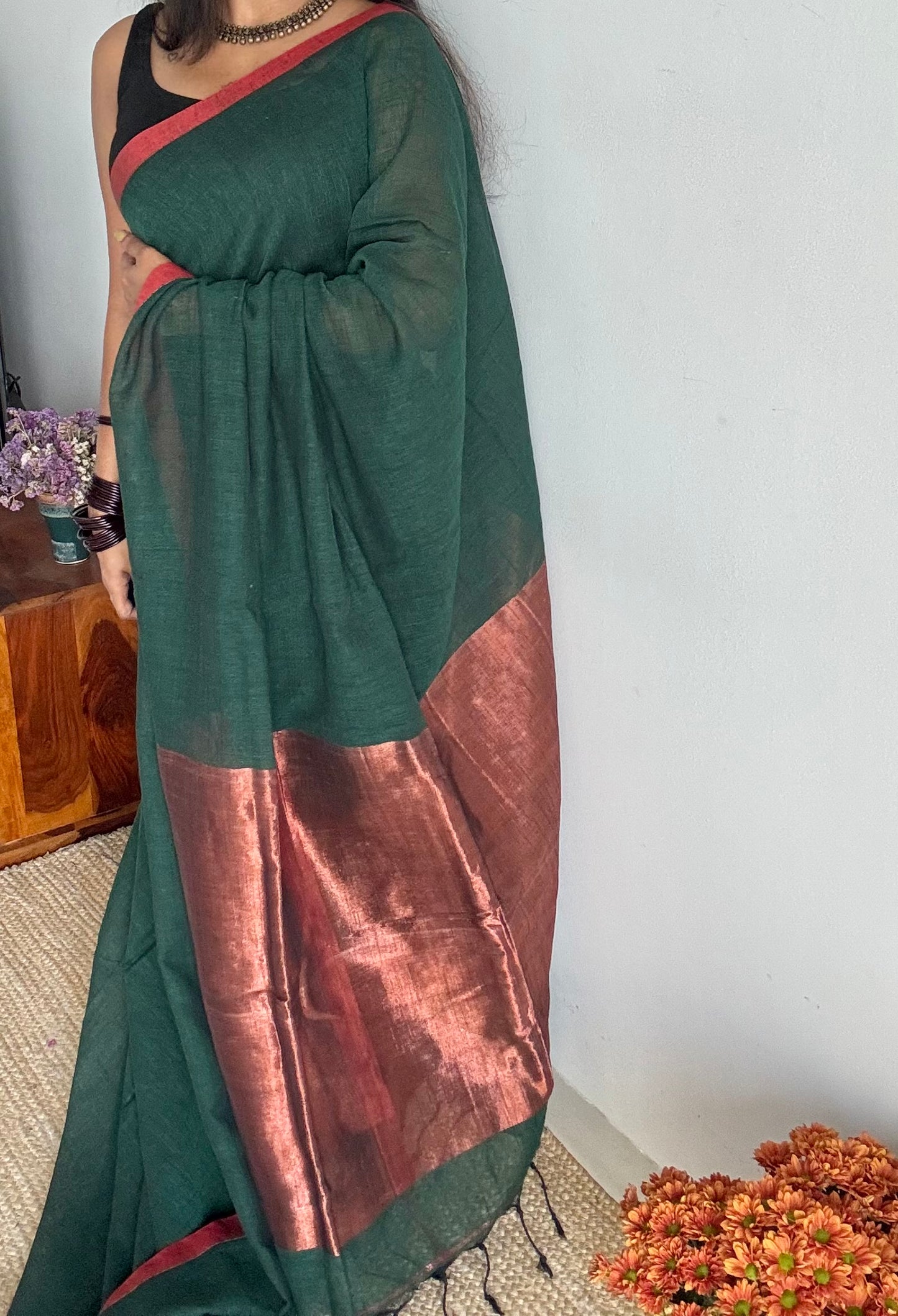 Dark green plain linen by cotton saree with copper zari pallu - YCBCLCFE397