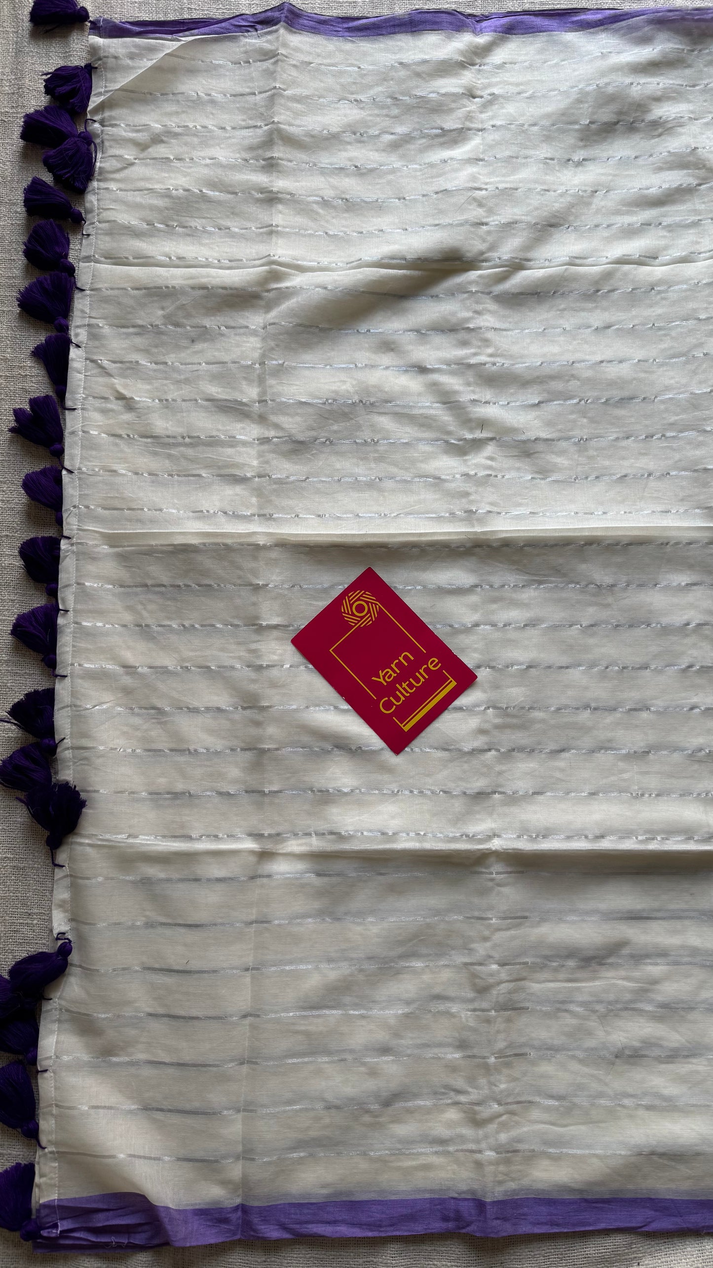 Ivory mul saree with silver zari stripes and purple border - YCBCMCFE288
