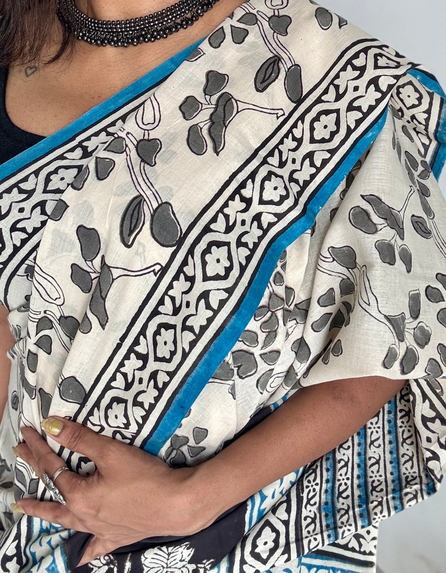 Beige with grey flowers, blue border, block printed soft cotton saree - YCTORCMA14
