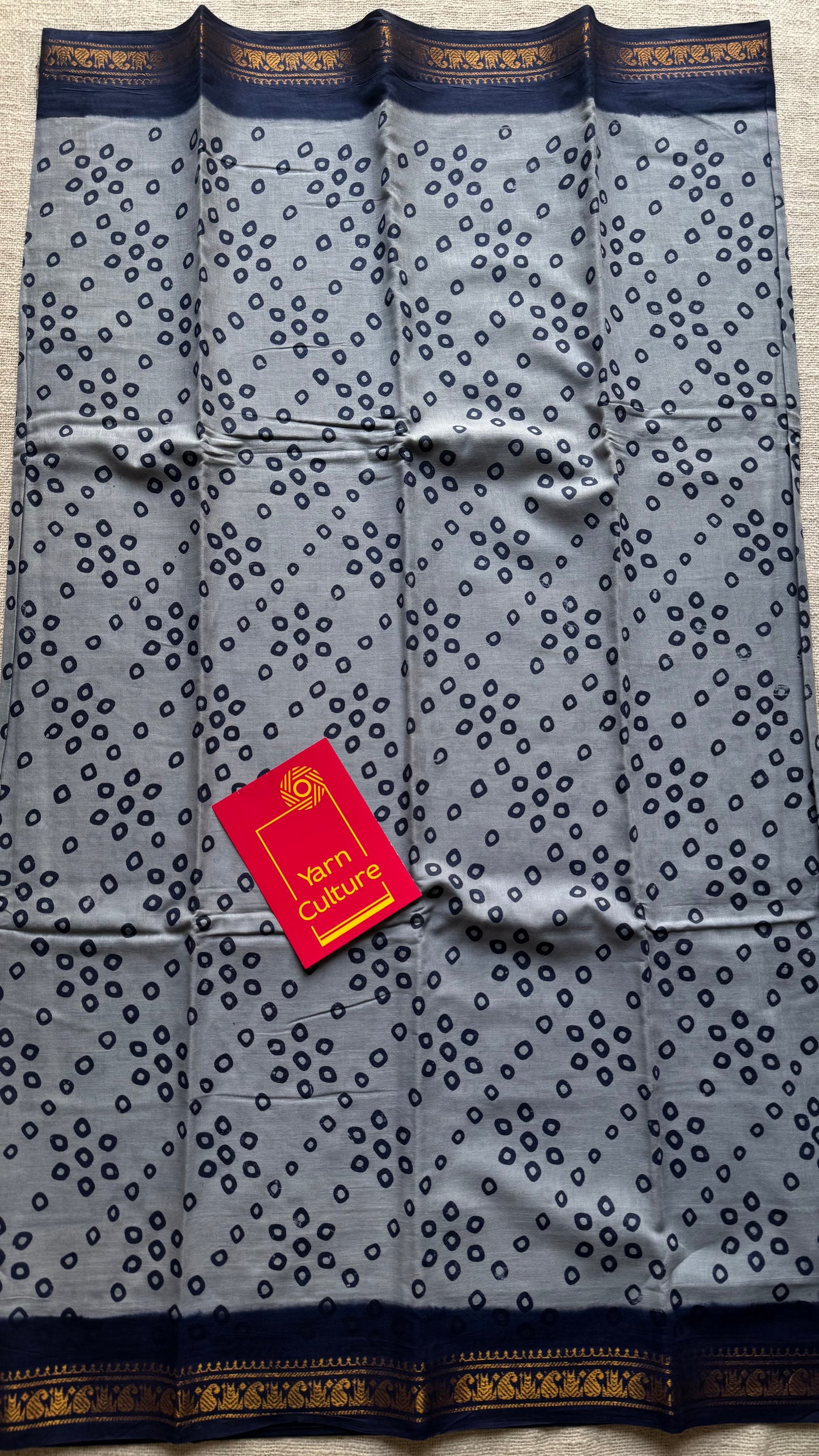 Cool grey with dark blue, motif printed, kattuchayam dyed madurai sungudi cotton saree - YCCOTNMSFE73