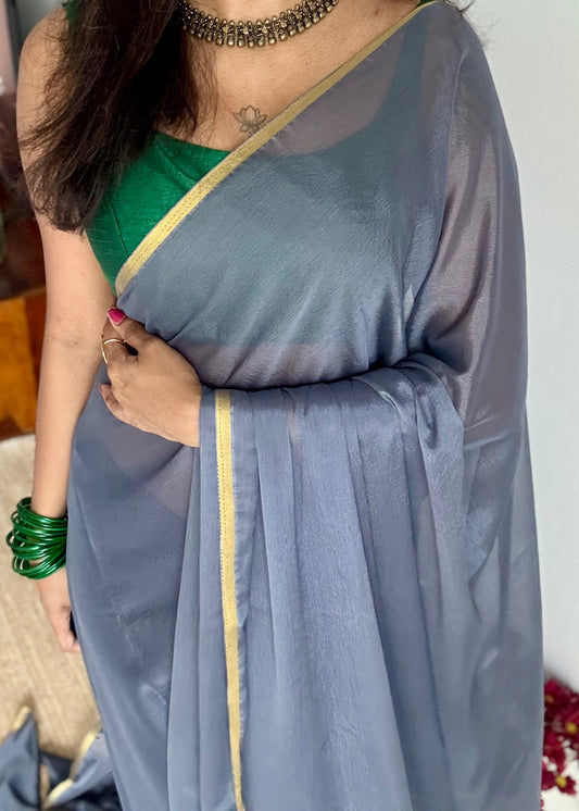 Grey chiffon with thin gold zari border - YCDESE23