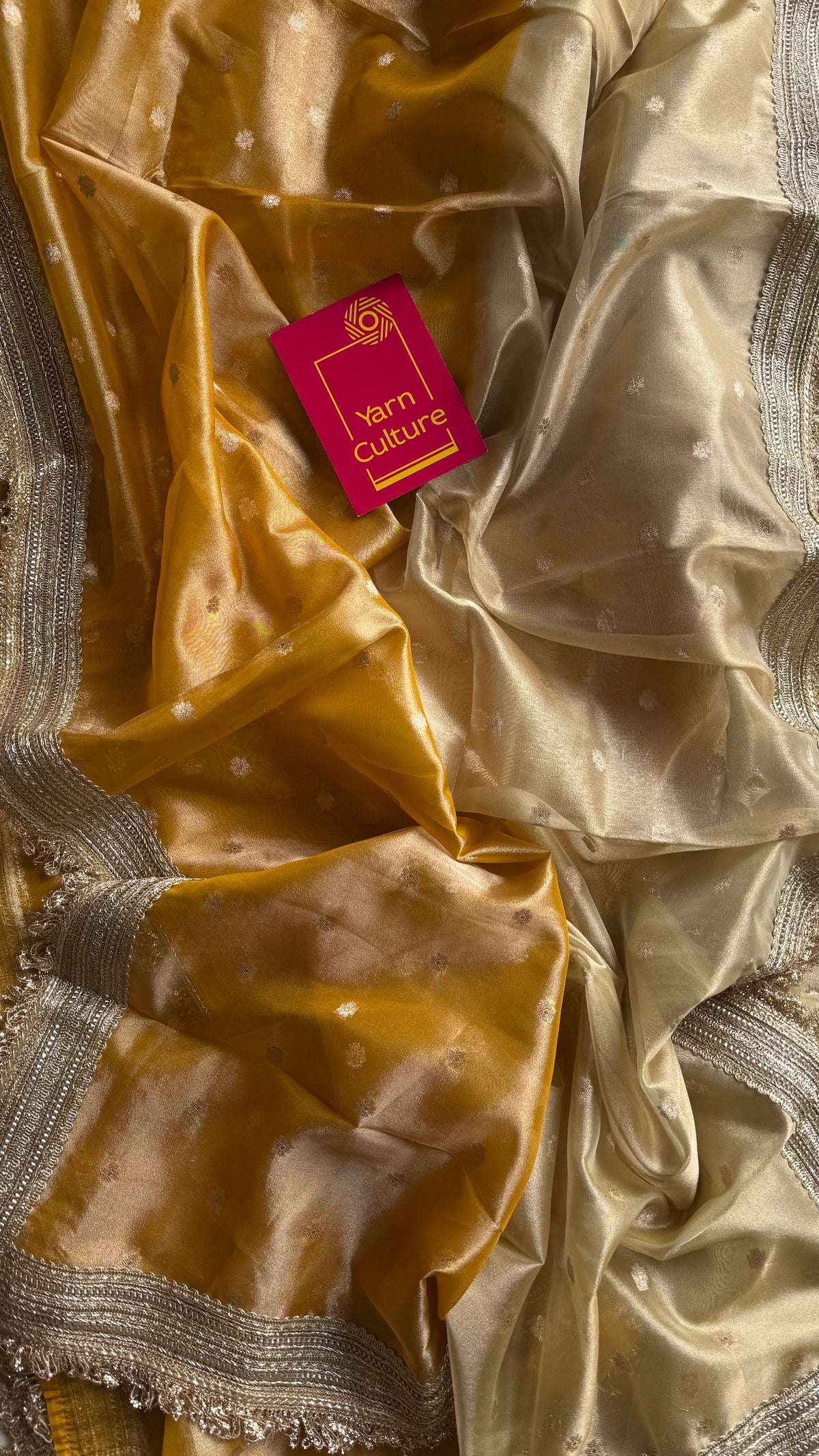 Light gold and dark gold Banarasi tissue saree, with buttas and embellished lace border - YCBLTOC65