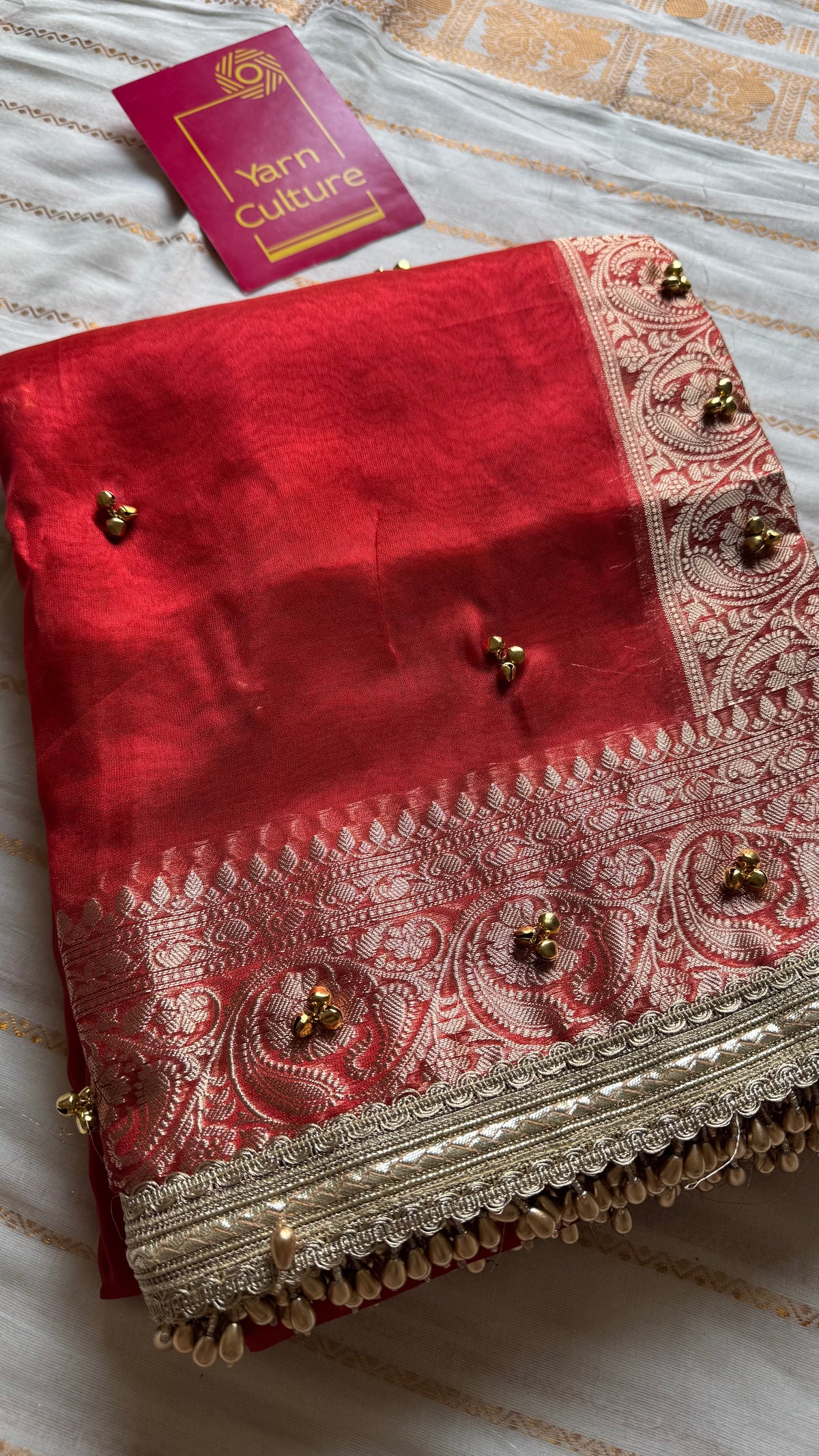 Red gold tissue Banarasi saree with ghungroo embellishments and beaded lace zari border - YCBLTOC69