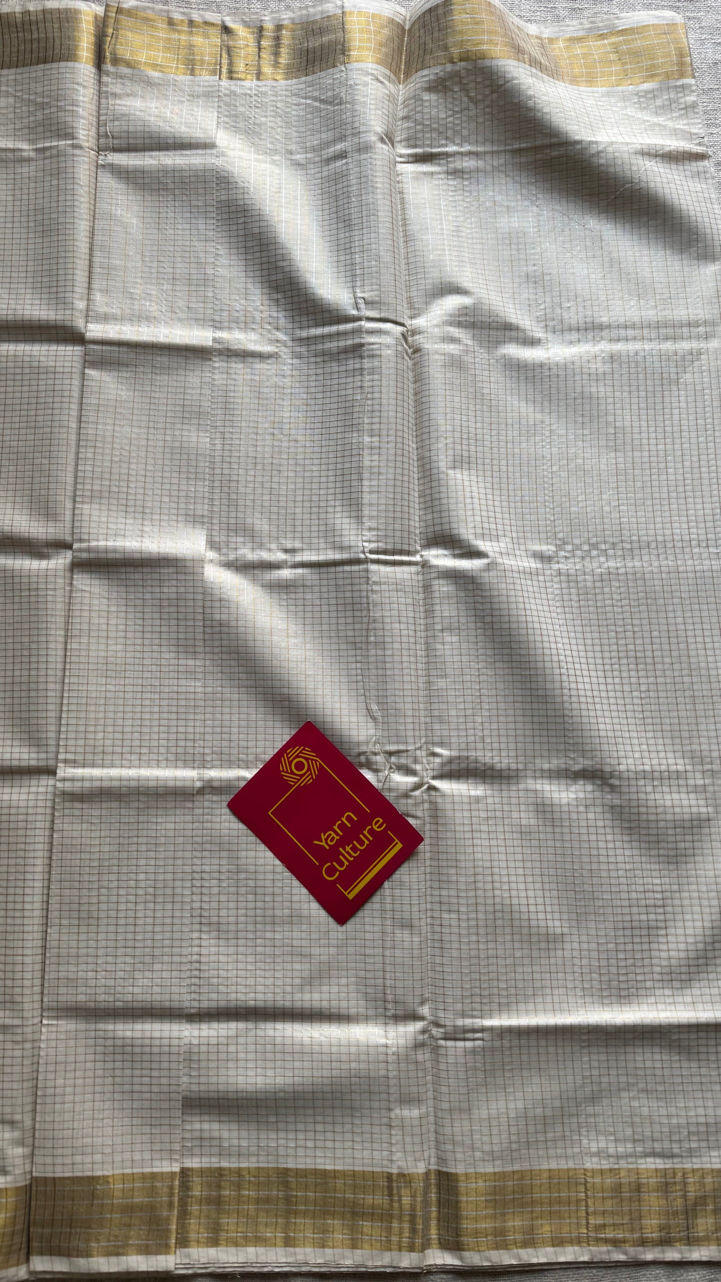 Ivory Kerala tissue cotton saree with silver and gold checks - YCIEKCFE308