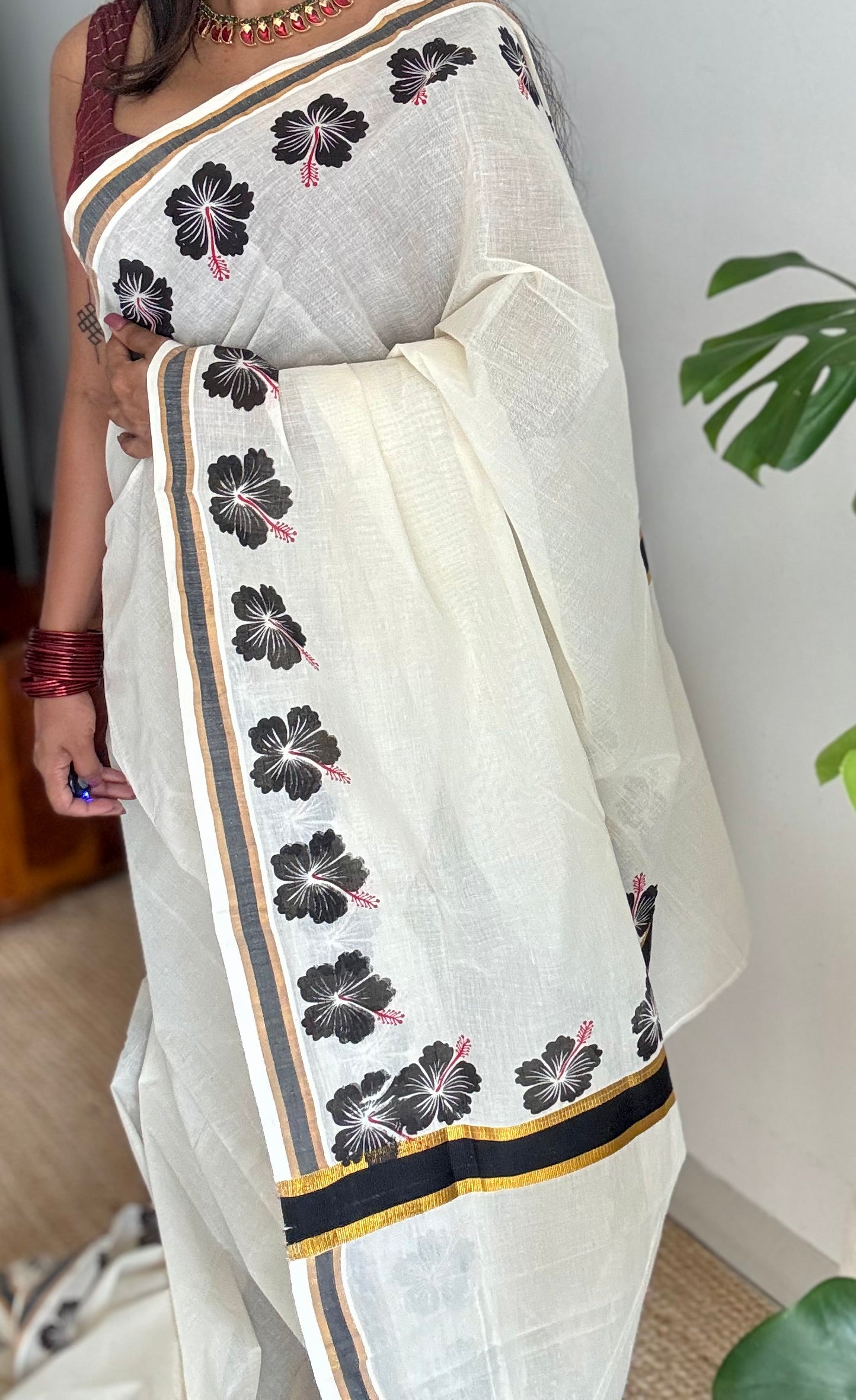 Ivory and gold soft cotton saree, black hibiscus (chembarathi) flowers - YCIEON61