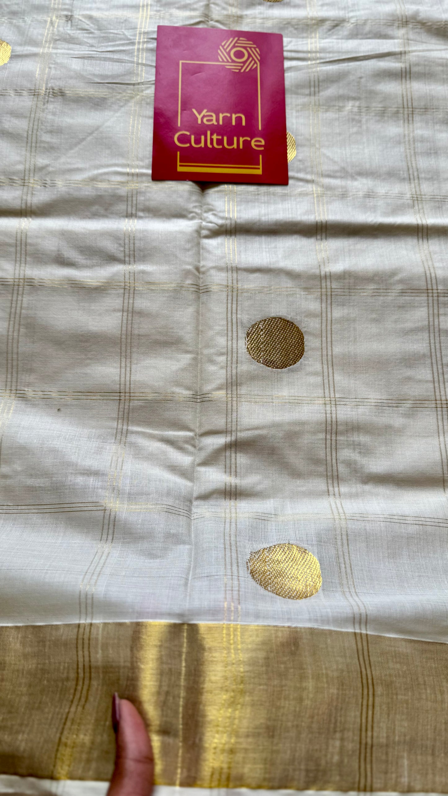 Ivory and gold kerala saree with gold buttas and checks - YCIEON41