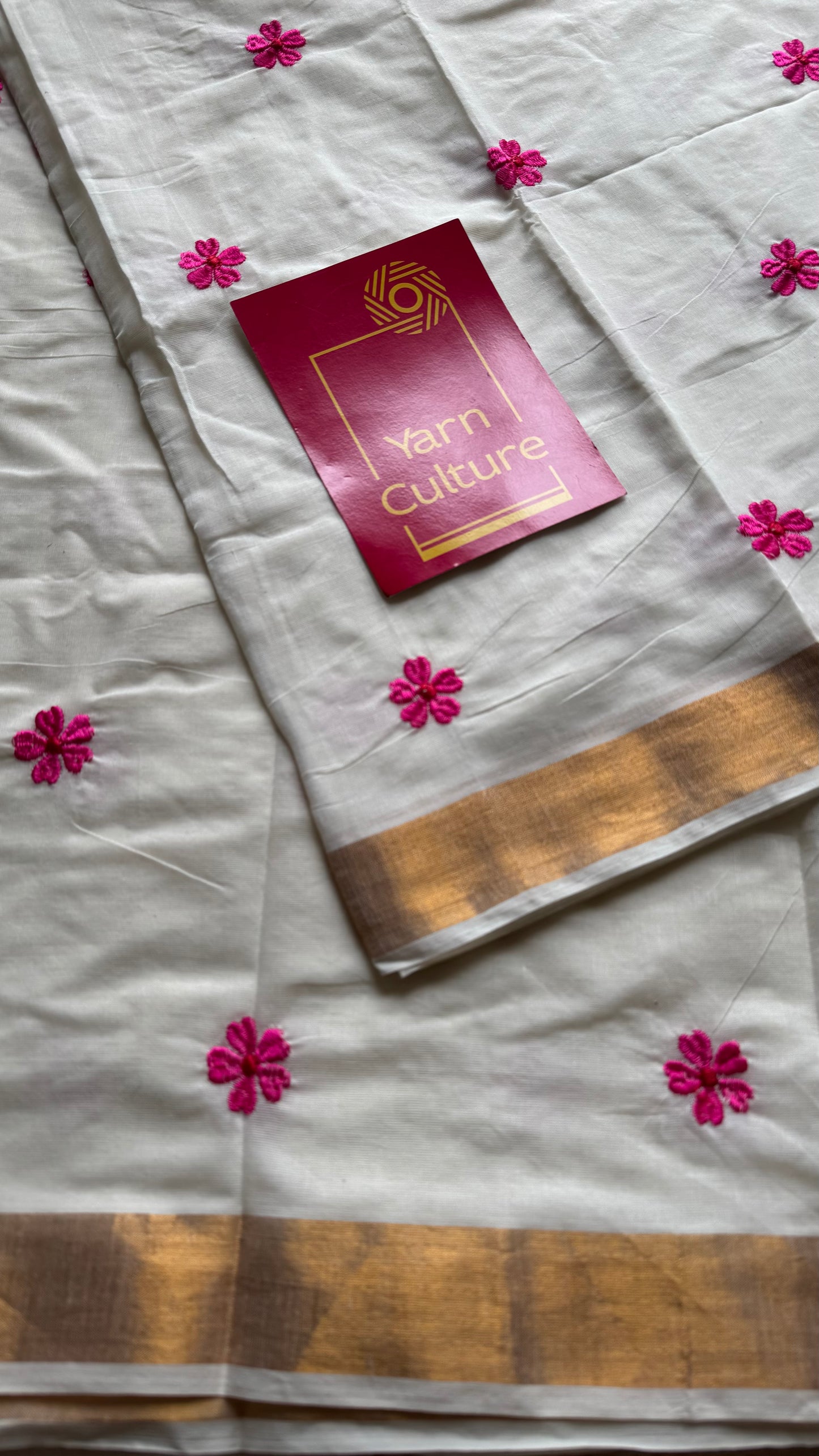 Ivory and antique gold soft cotton kasavu saree, pink parijat floral embroidery - YCIEON155