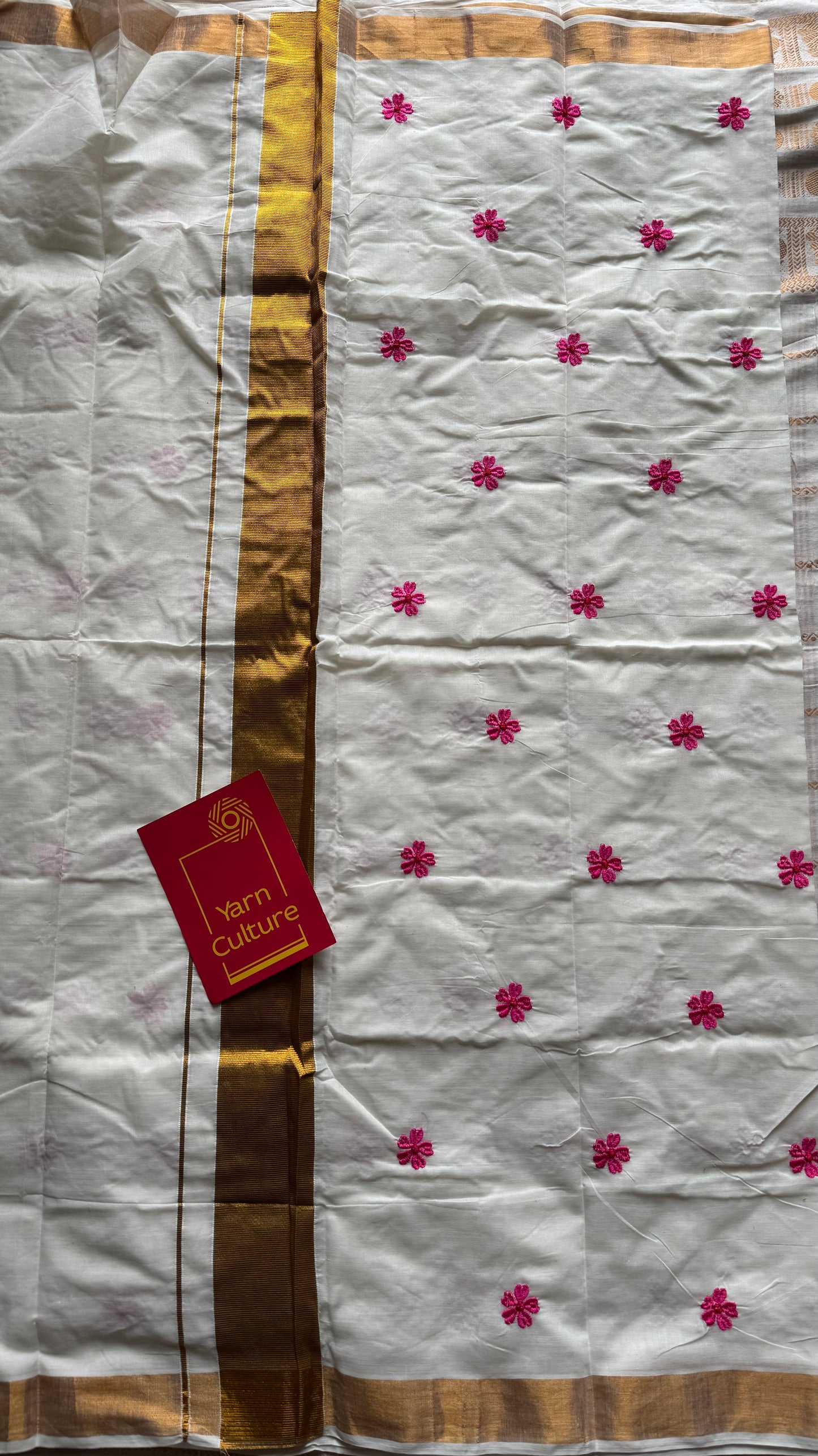 Ivory and antique gold soft cotton kasavu saree, pink parijat floral embroidery - YCIEON155