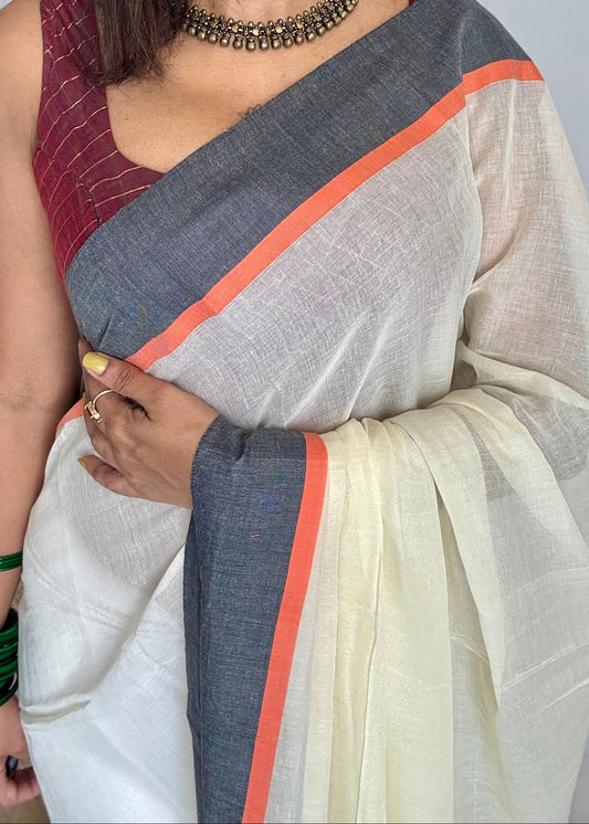 Ivory mul saree with black and orange border - YCBCMCFE293