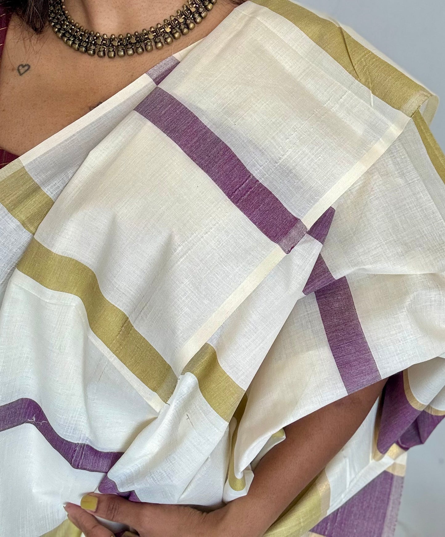 Ivory Kerala cotton saree with purple and green stripes - YCIEKCFE306