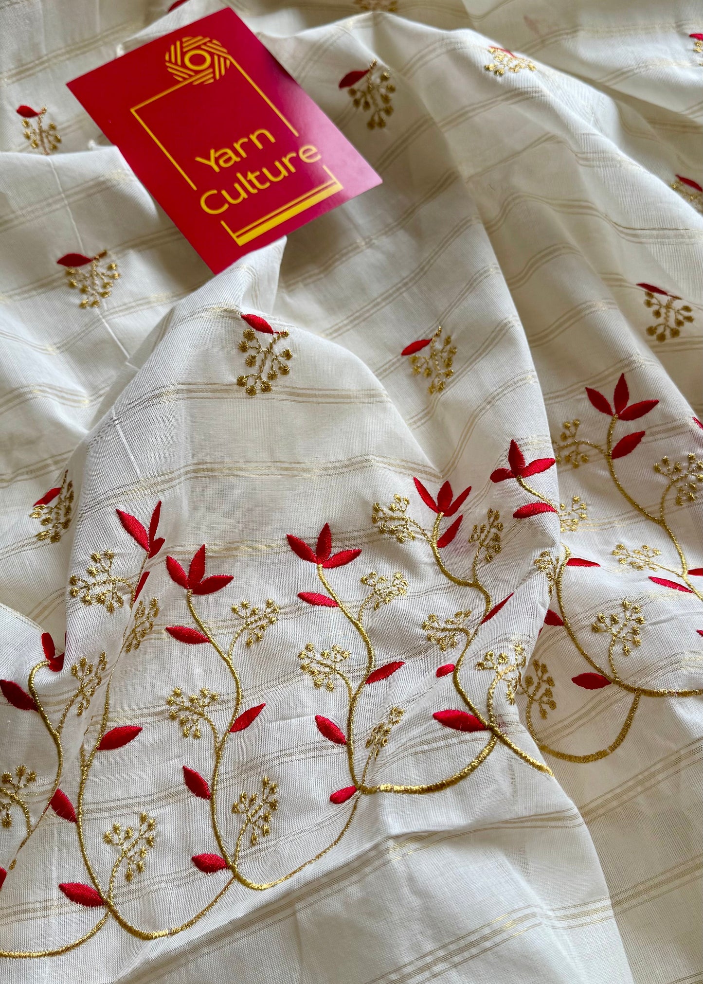 Ivory and gold soft cotton saree, red floral vine embroidery - YCIEON60