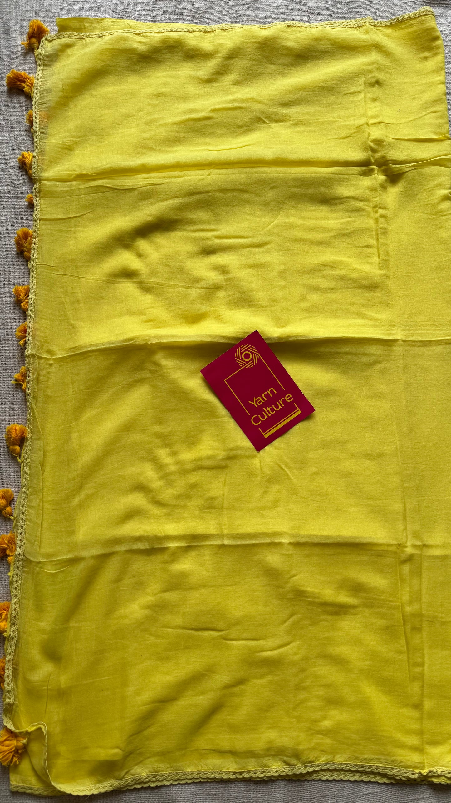 Yellow plain mul saree with lace border - YCBCMCFE402