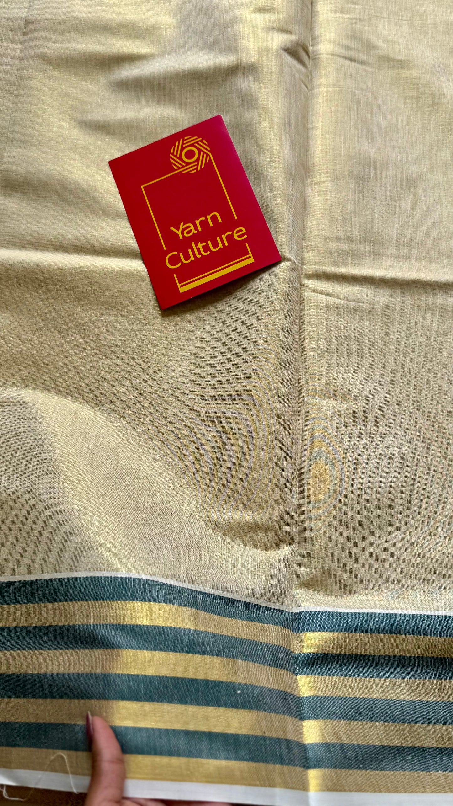 Ivory and gold soft tissue cotton saree, dark green border - YCIEON68