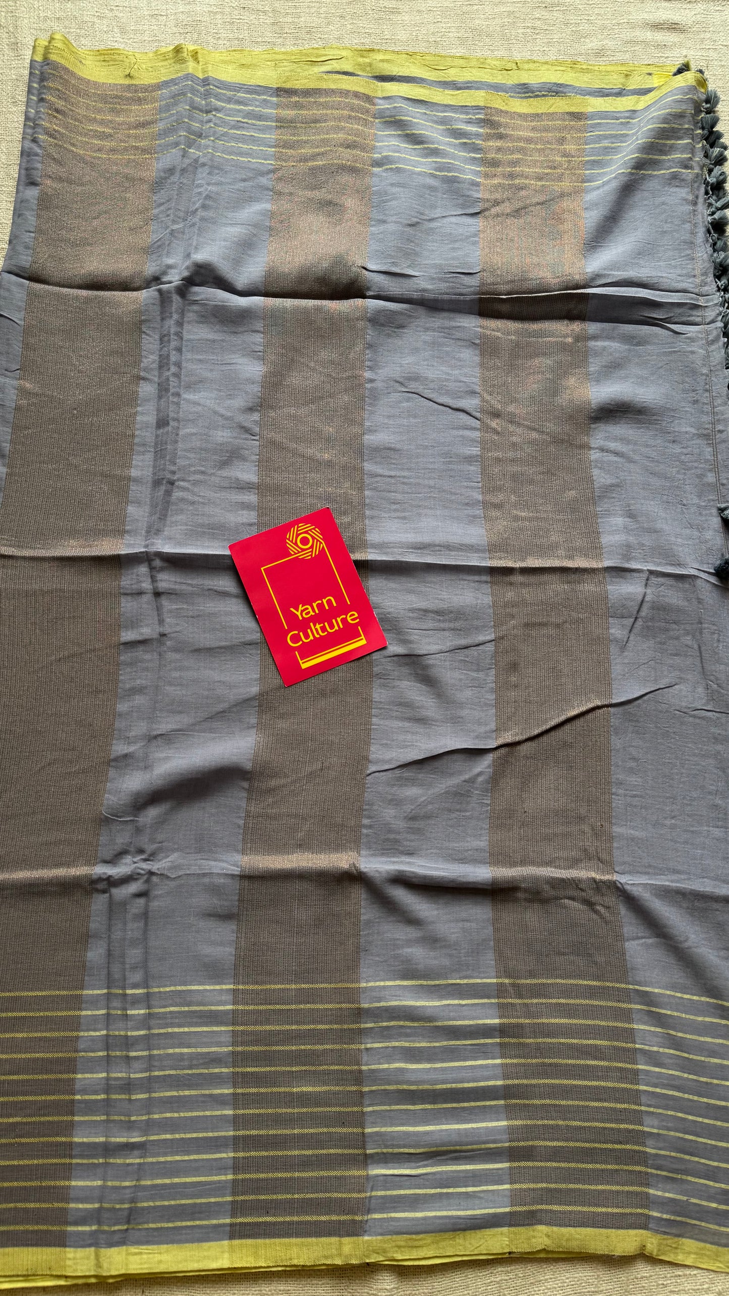 Grey handloom mul saree with custard yellow checkered borders and antique gold buttas - YCBCMCFE387