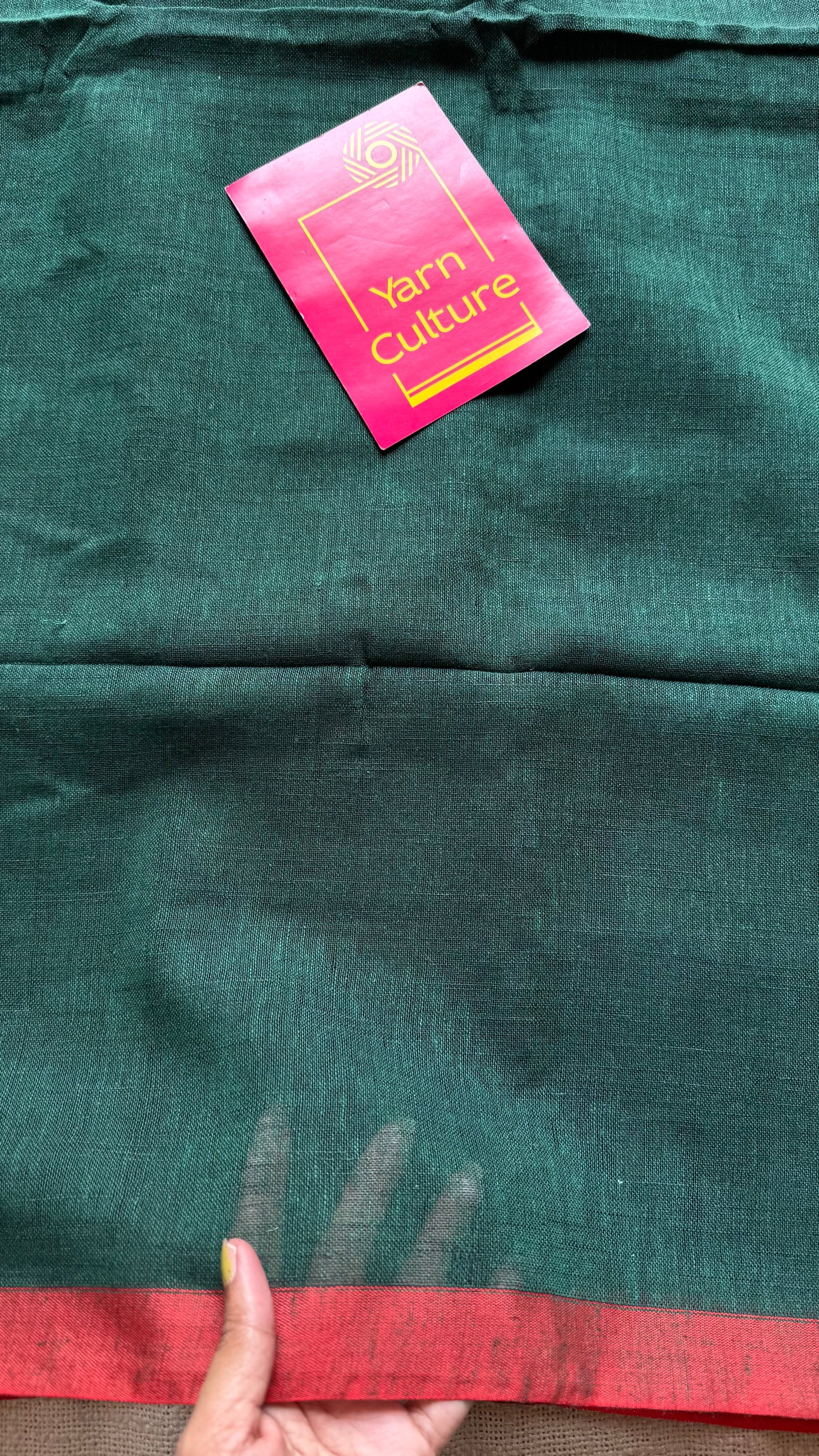 Dark green plain linen by cotton saree with copper zari pallu - YCBCLCFE397