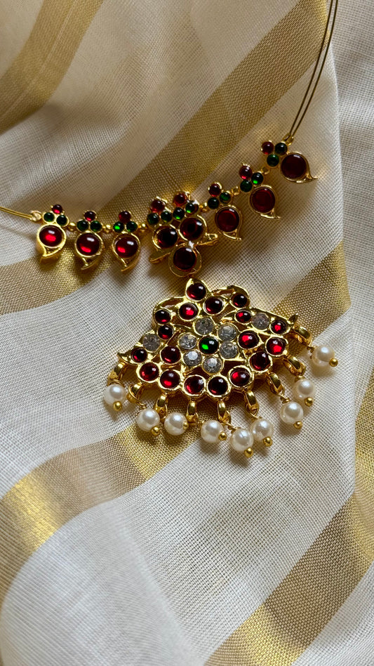 Red and white stone pendant necklace