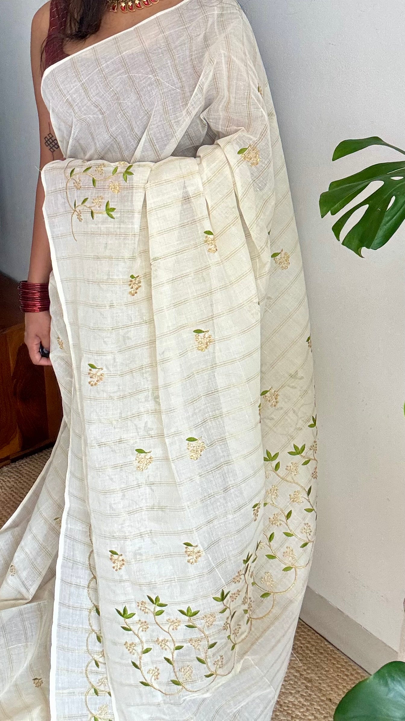 Ivory and gold soft cotton saree, light green floral vine embroidery - YCIEON59