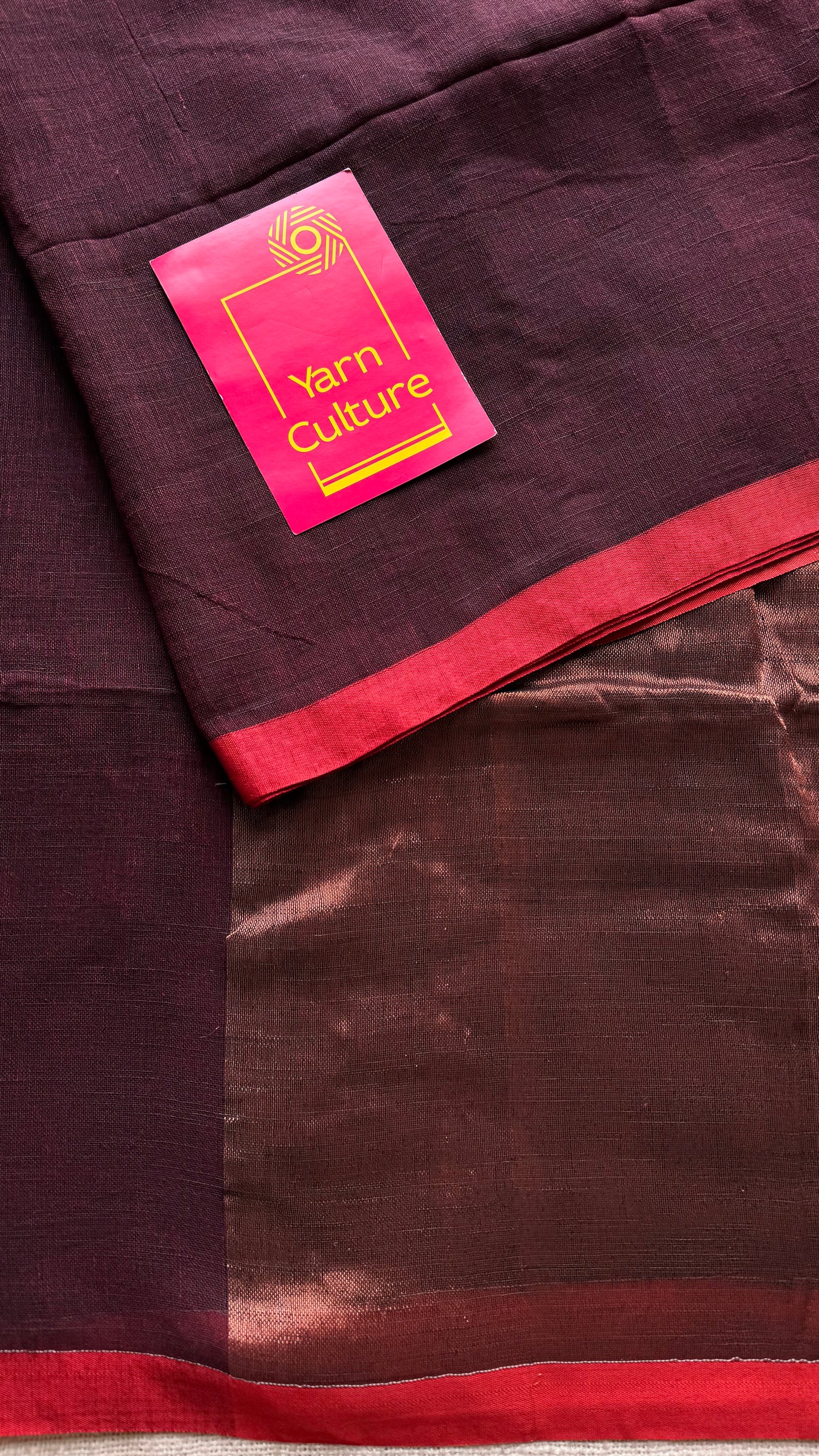 Maroon plain linen by cotton saree with copper zari pallu - YCBCLCFE398