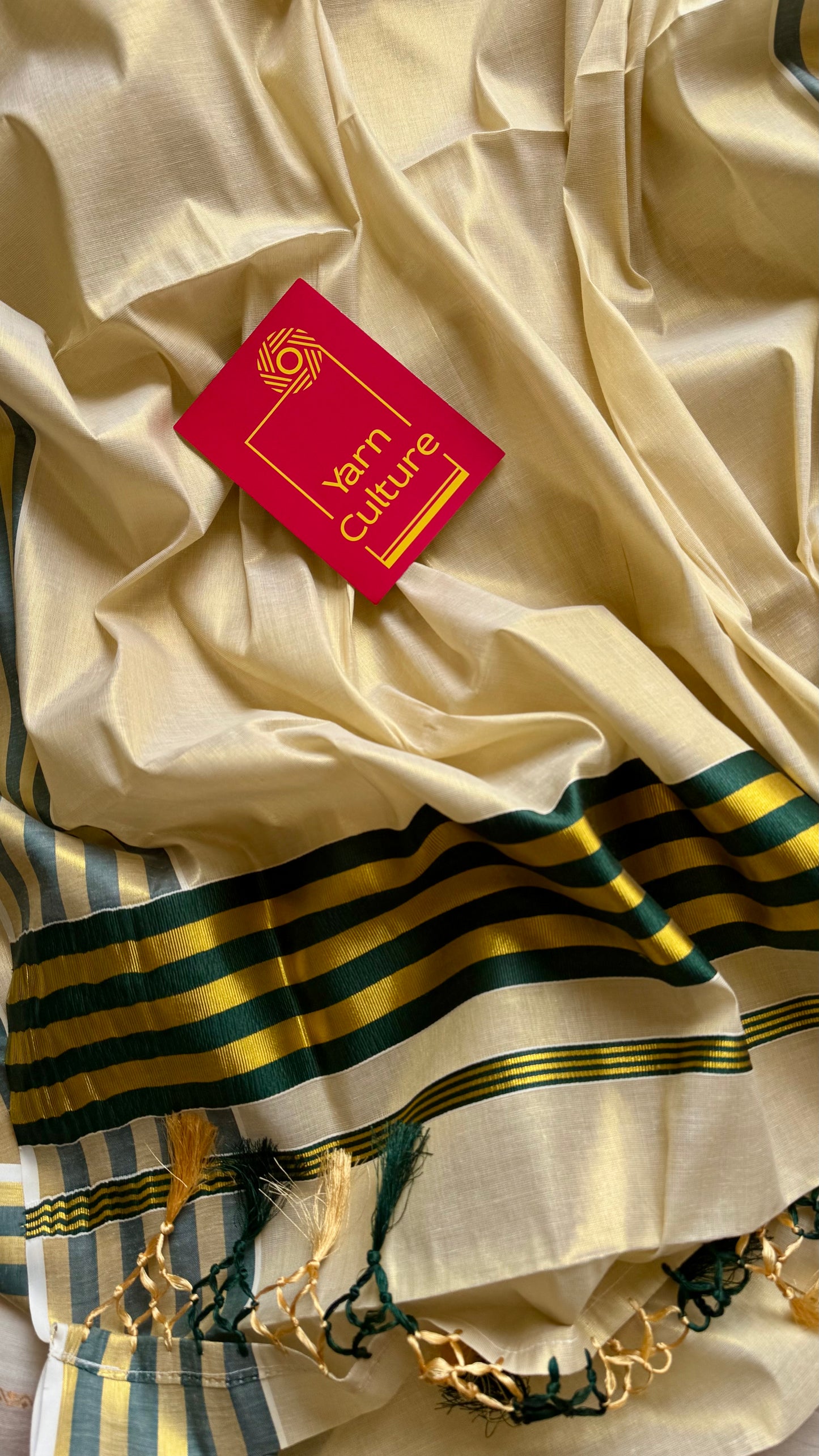 Ivory and gold soft tissue cotton saree, dark green border - YCIEON68