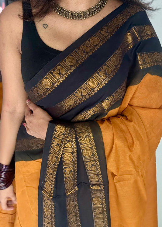 Turmeric yellow with black border, peacock and rudraksham motif, madurai soft cotton - YCCOTNJUSC01
