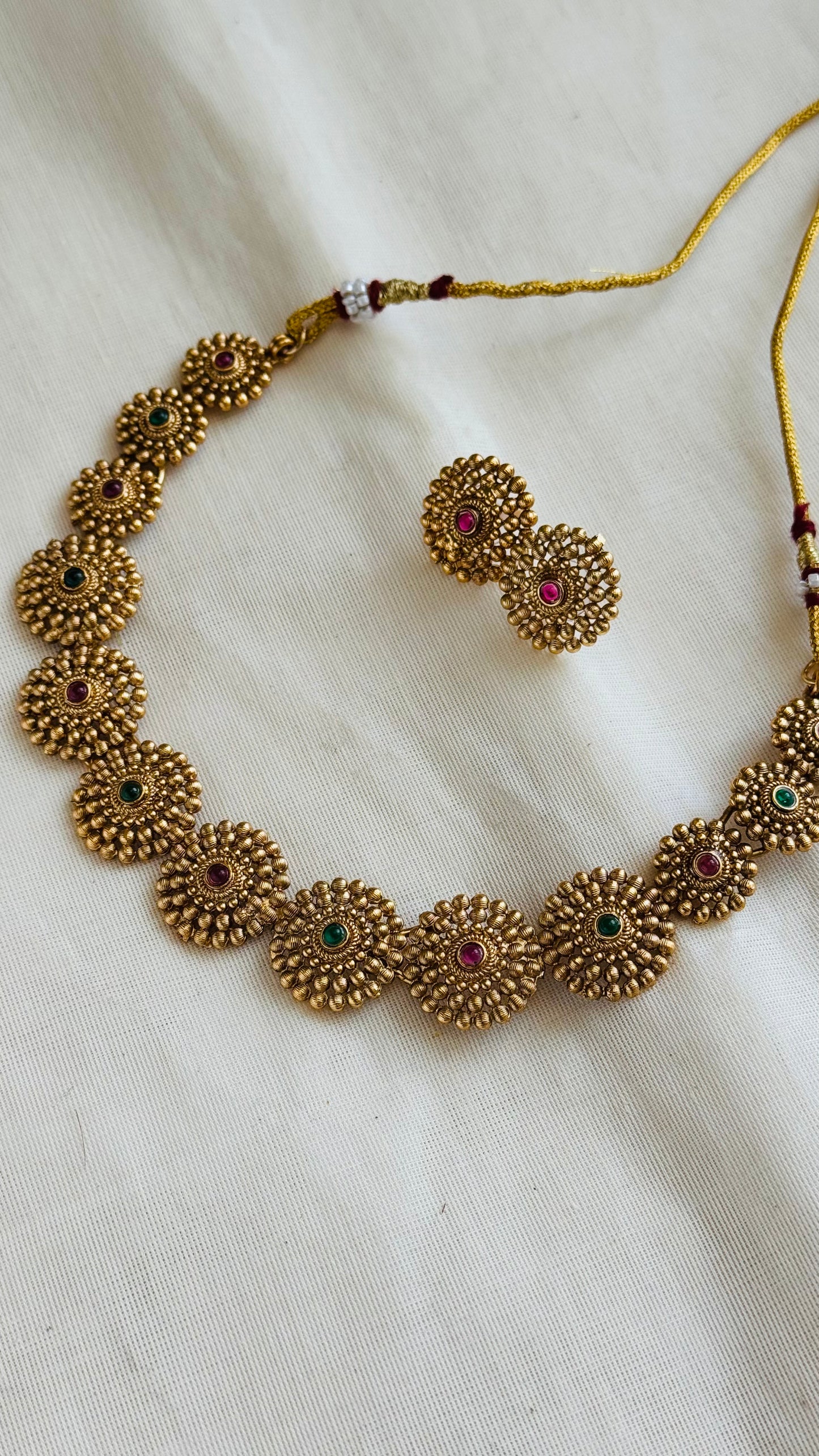 Round floral neckpiece, ruby and green stones, with earrings - YCGPNP751