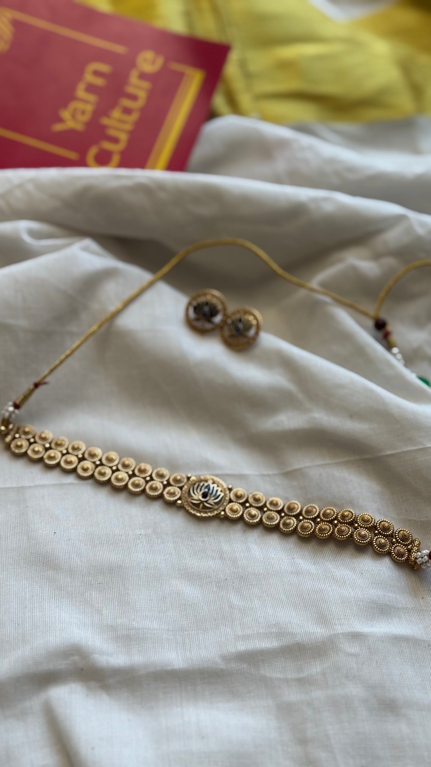 Double layered coin neckpiece with blue lotus pendant, with earrings - YCGPNP625