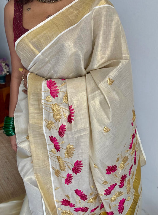 Ivory and gold tissue kerala cotton saree with hot pink and gold lotus embroidery - YCIEKCFE315