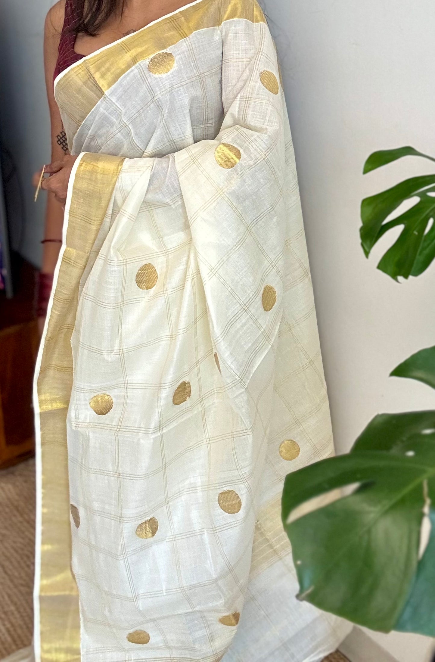 Ivory and gold kerala saree with gold buttas and checks - YCIEON41