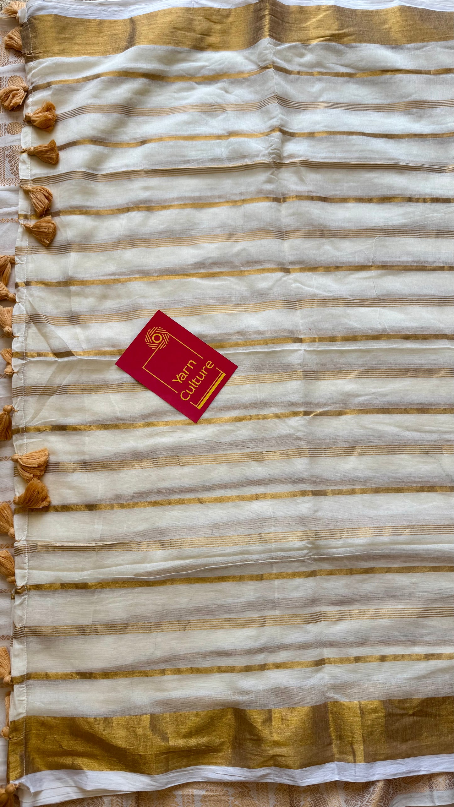 Ivory mul saree, gold stripes - YCIEON01