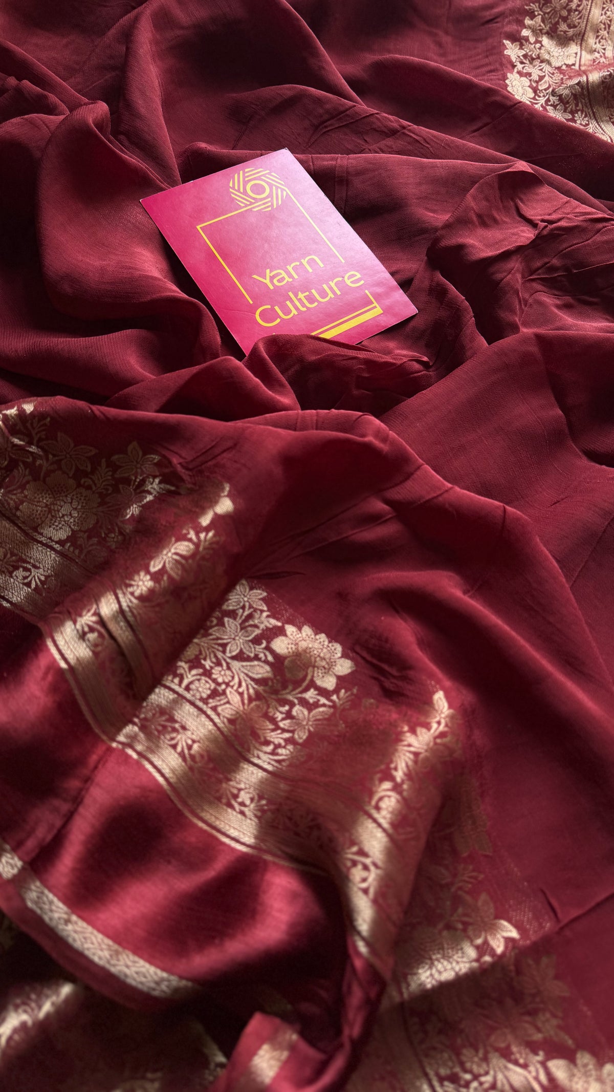 Maroon, semi crepe silk saree with antique gold floral border - YCLOKOC52