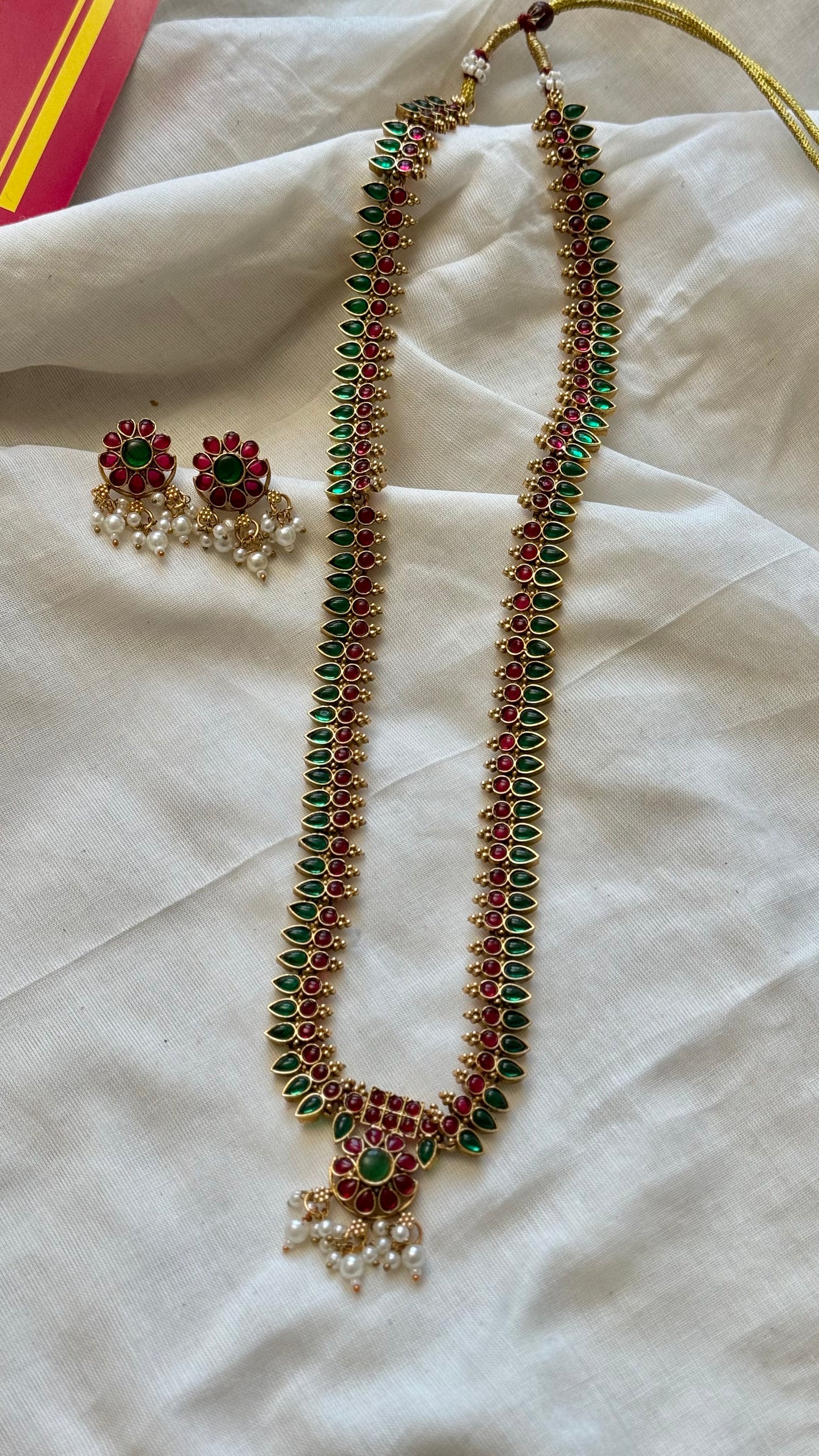 Long mullamottu (bud shaped) green and red neckpiece with earrings - YCGPNP680