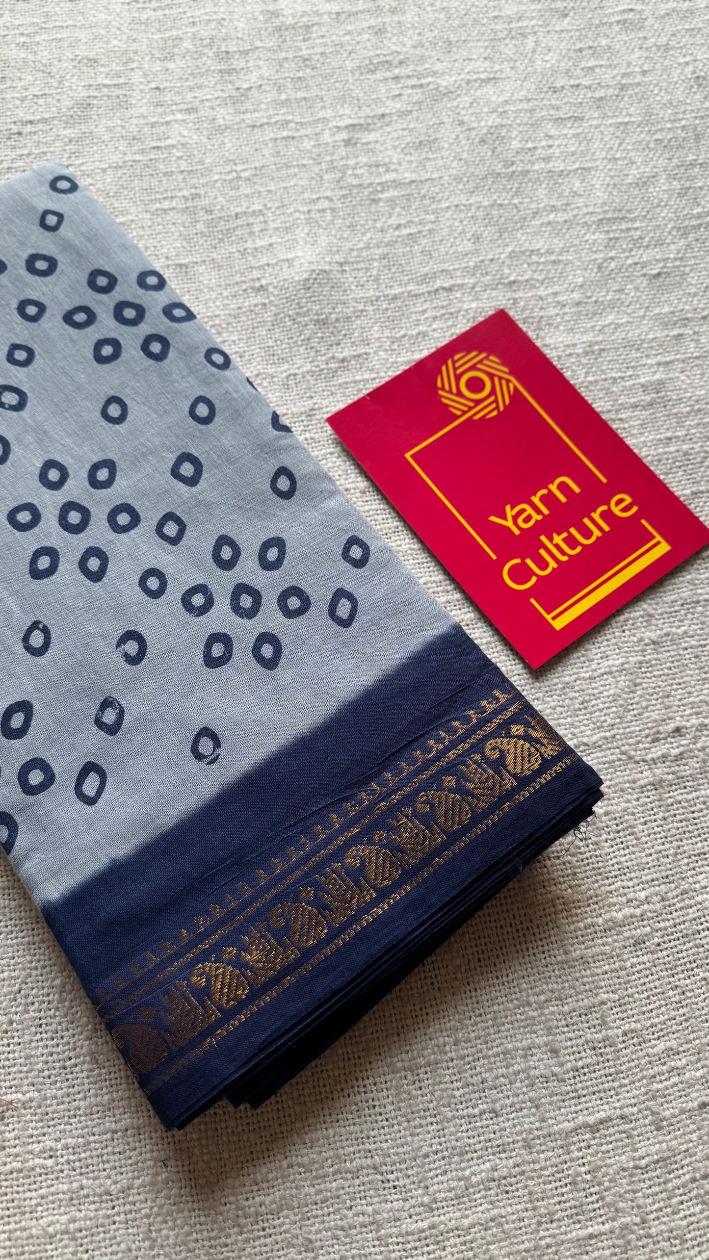 Cool grey with dark blue, motif printed, kattuchayam dyed madurai sungudi cotton saree - YCCOTNMSFE73