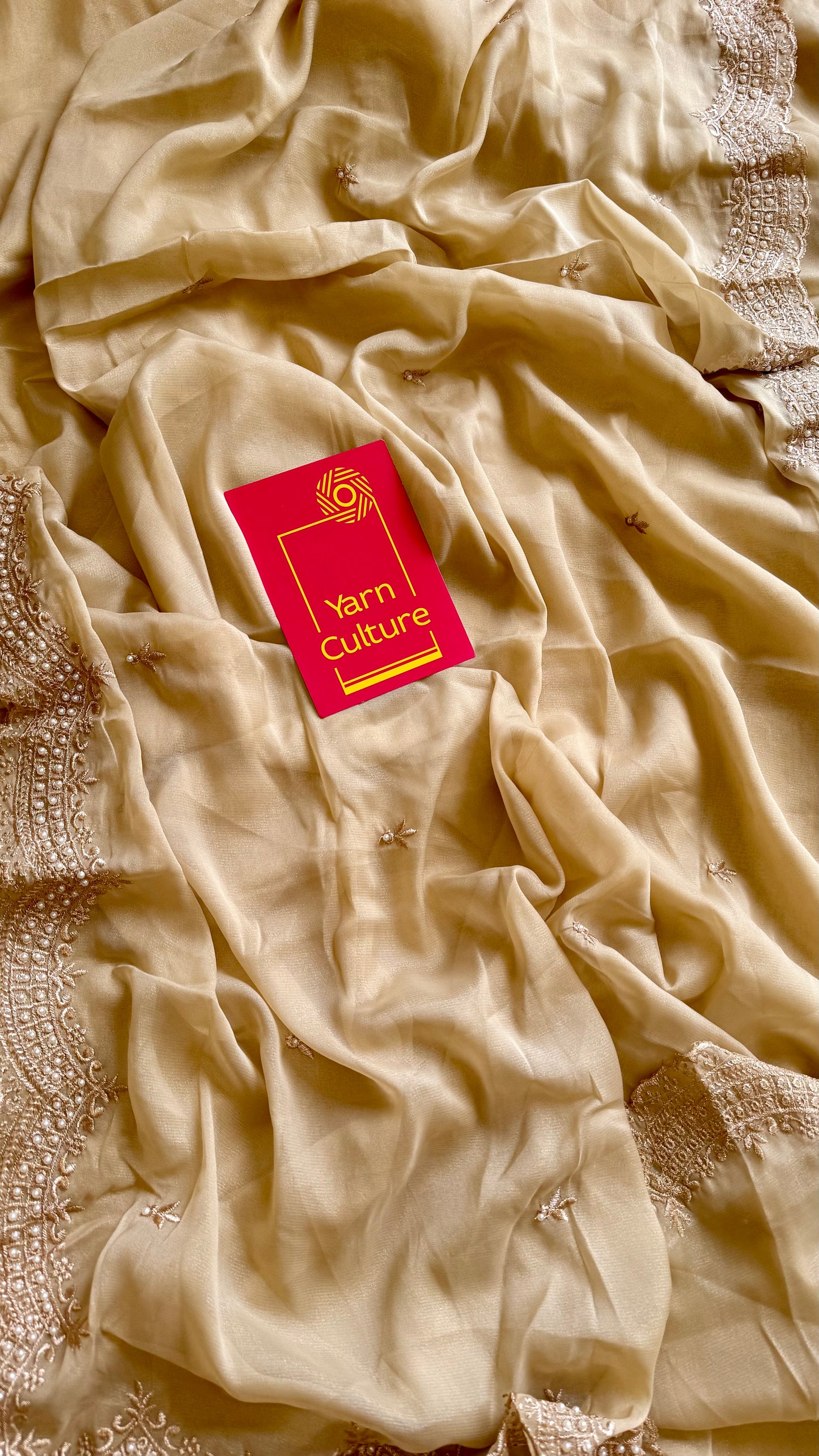 Gold soft chiffon saree, with pearl embellished border - YCIEON85