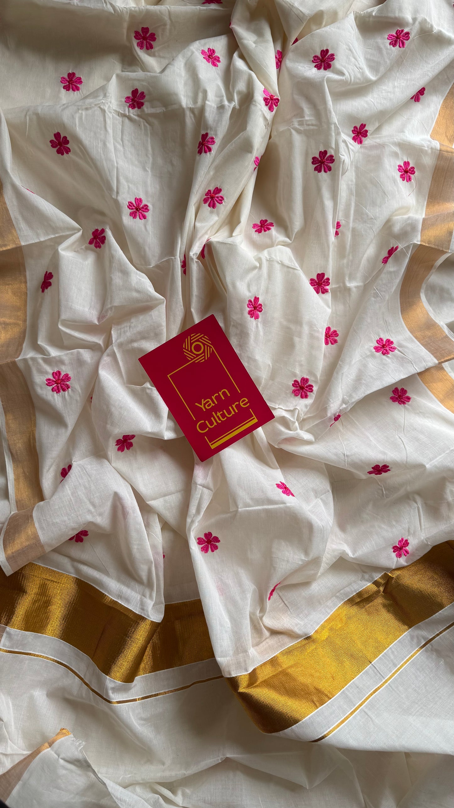 Ivory and antique gold soft cotton kasavu saree, pink parijat floral embroidery - YCIEON155