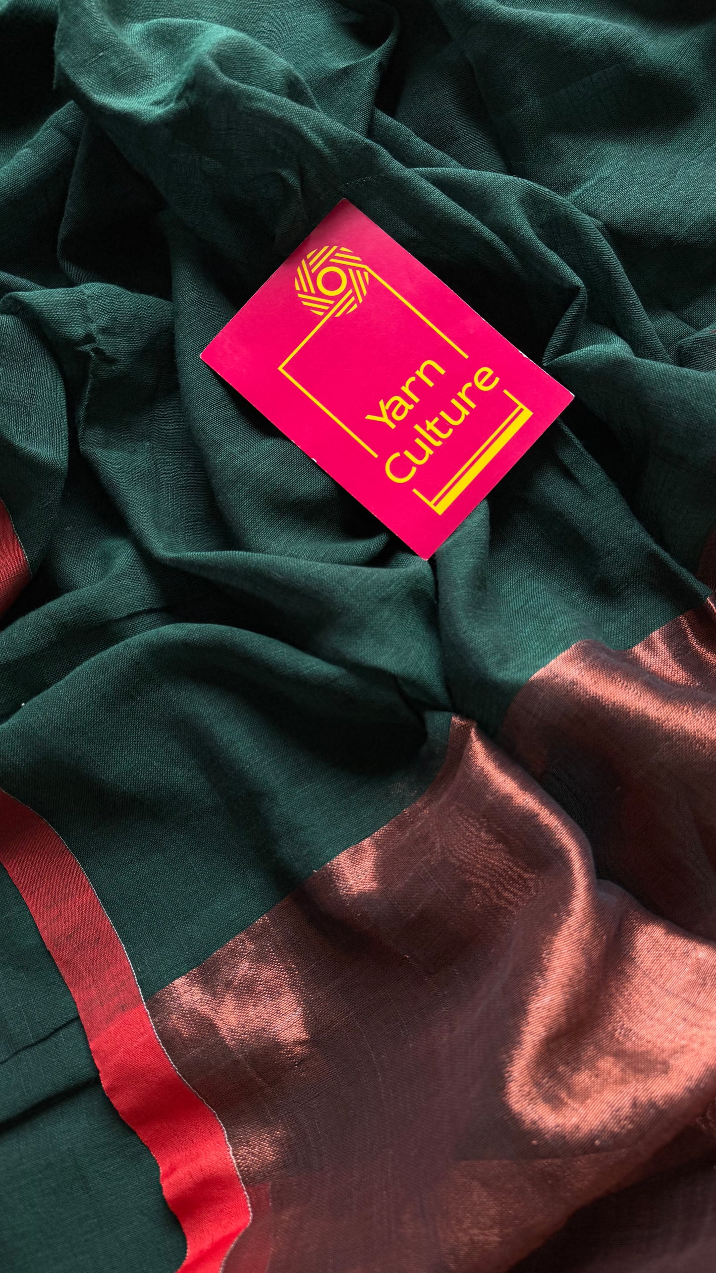 Dark green plain linen by cotton saree with copper zari pallu - YCBCLCFE397