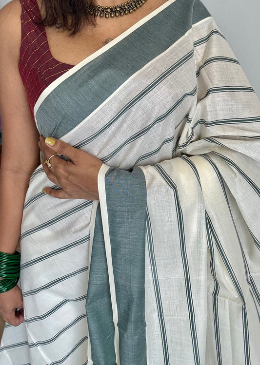 Ivory Kerala cotton saree with green stripes and border - YCIEKCFE323