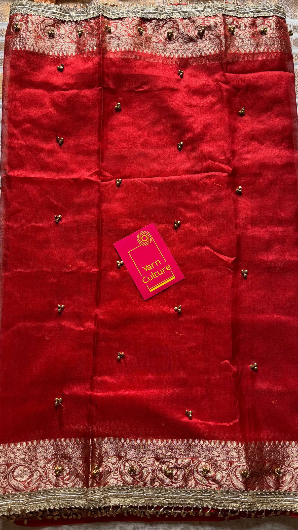 Red gold tissue Banarasi saree with ghungroo embellishments and beaded lace zari border - YCBLTOC69
