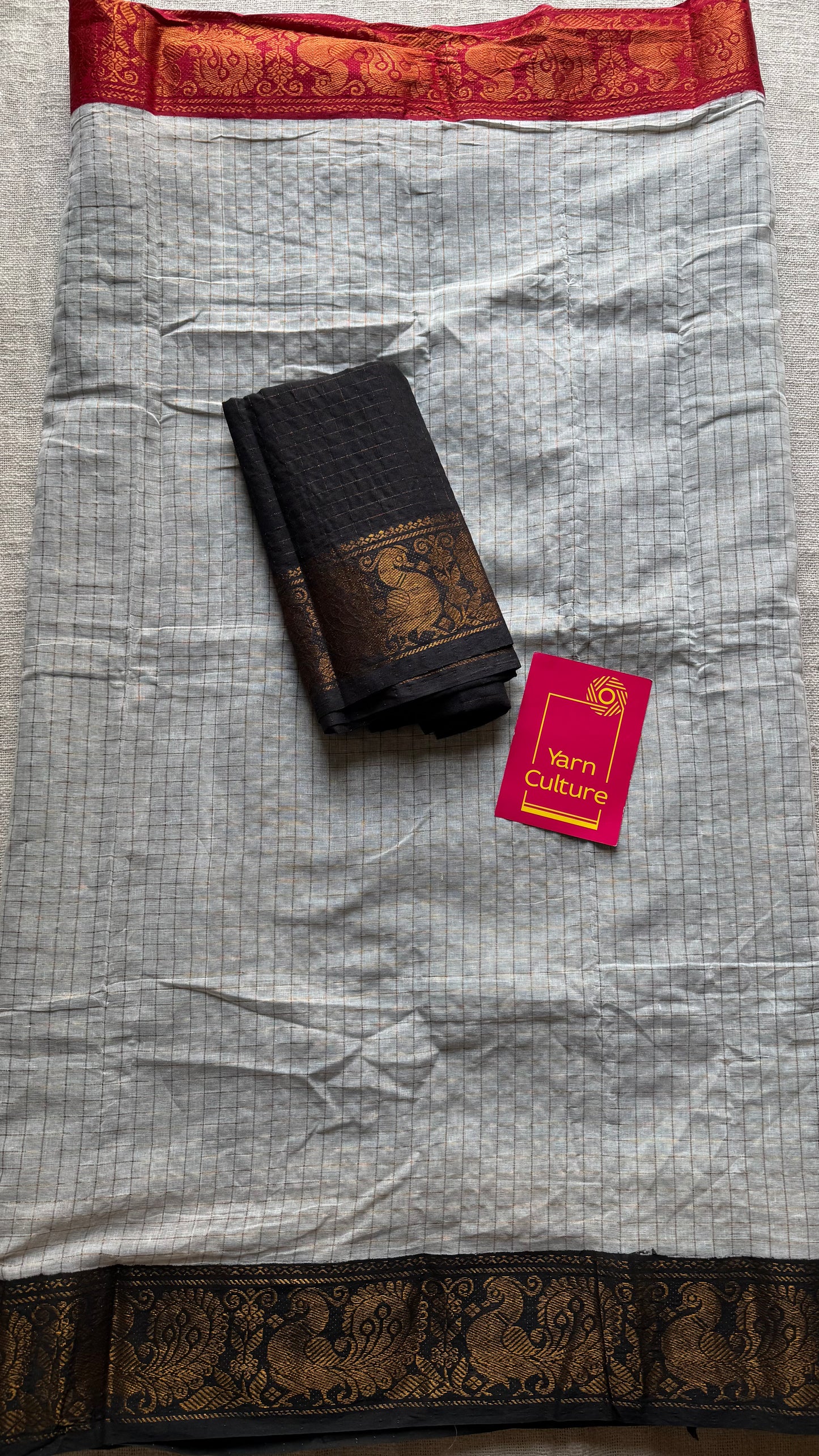 Ivory and red with black, sungudi cotton half-half saree - YCCOTNMSFE375