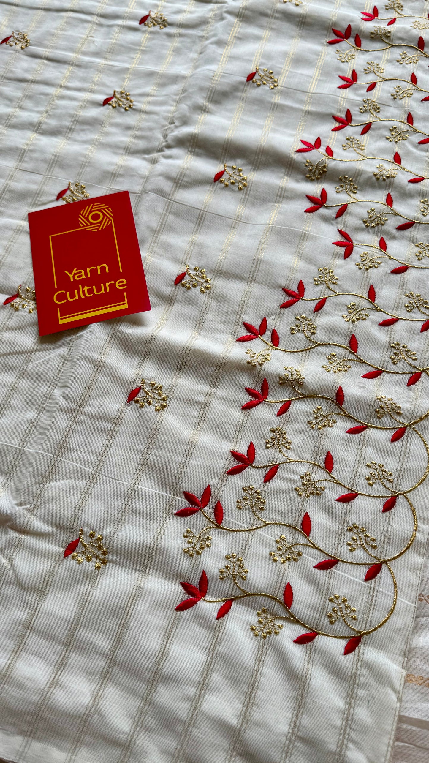 Ivory and gold soft cotton saree, red floral vine embroidery - YCIEON60