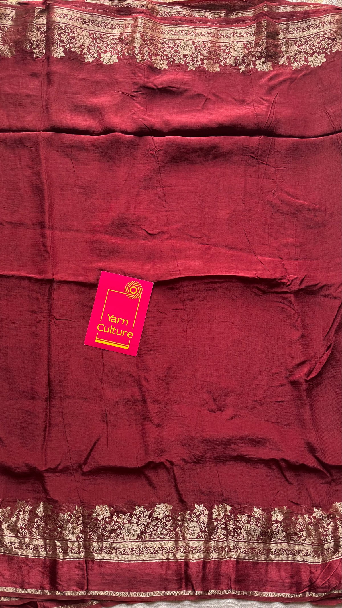 Maroon, semi crepe silk saree with antique gold floral border - YCLOKOC52