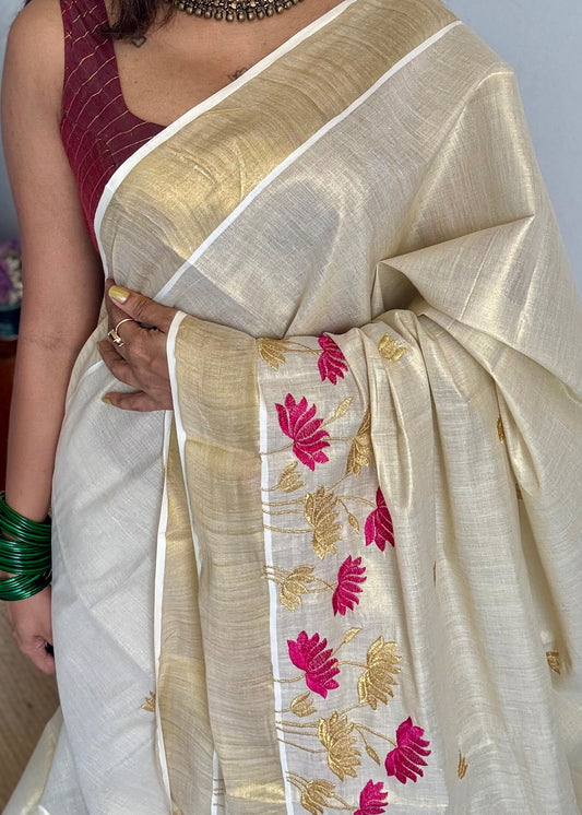 Ivory and gold tissue kerala cotton saree with hot pink and gold lotus embroidery - YCIEKCFE315